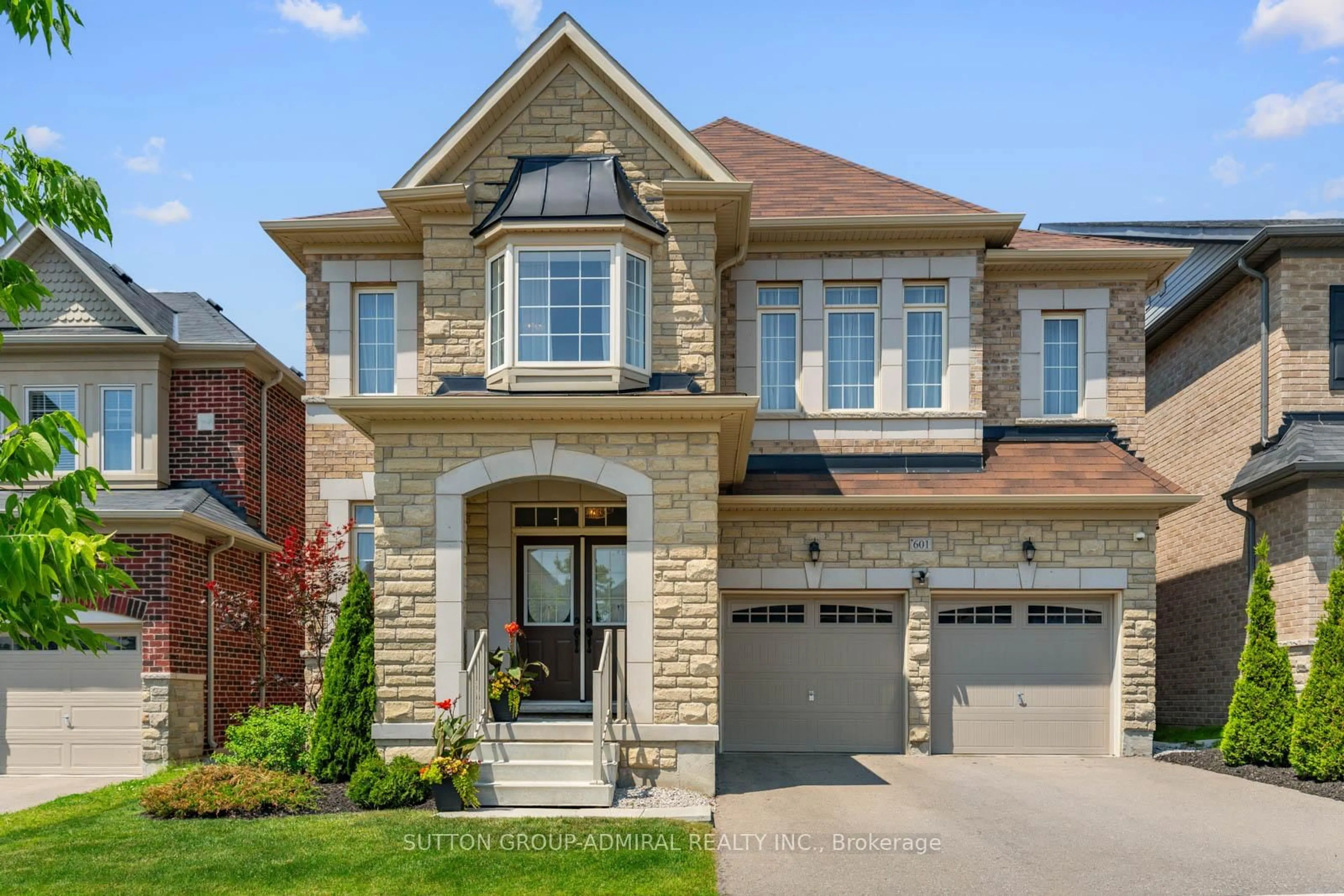 Home with brick exterior material, street for 601 Mactier Dr, Vaughan Ontario L4H 4T9
