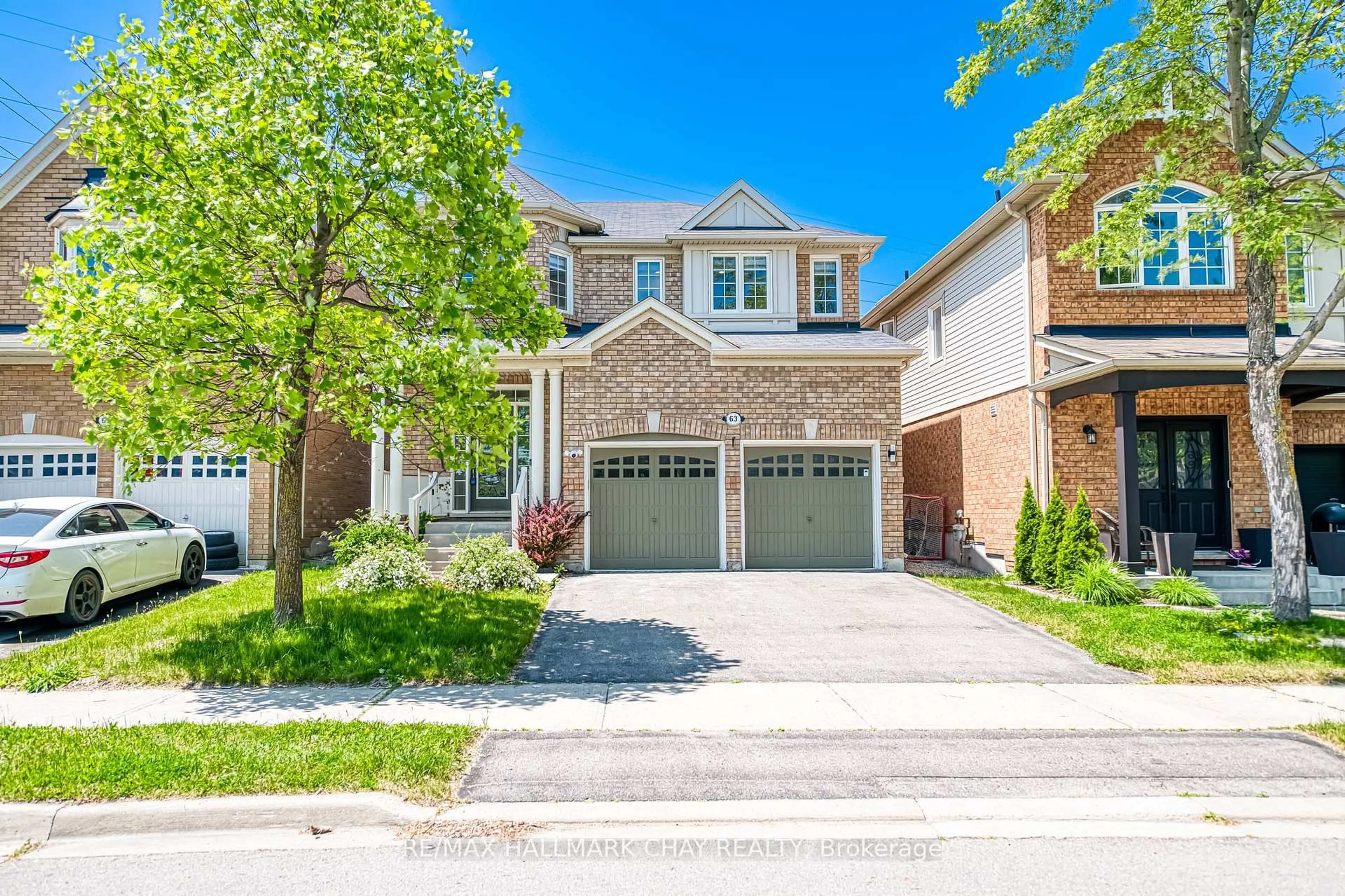 Home with brick exterior material, street for 63 Ross Patrick Cres, Newmarket Ontario L3X 3K3