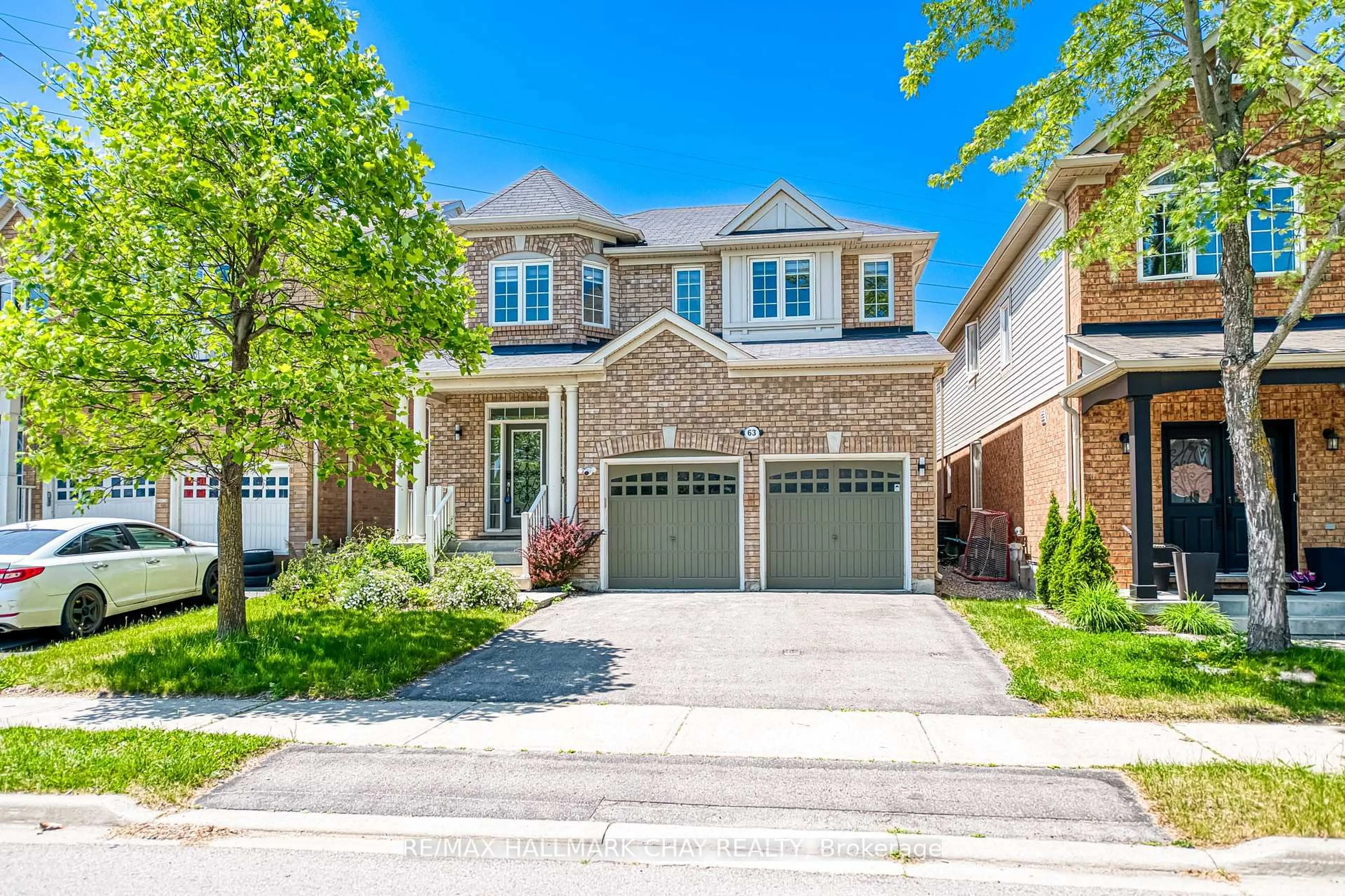 Home with brick exterior material, street for 63 Ross Patrick Cres, Newmarket Ontario L3X 3K3