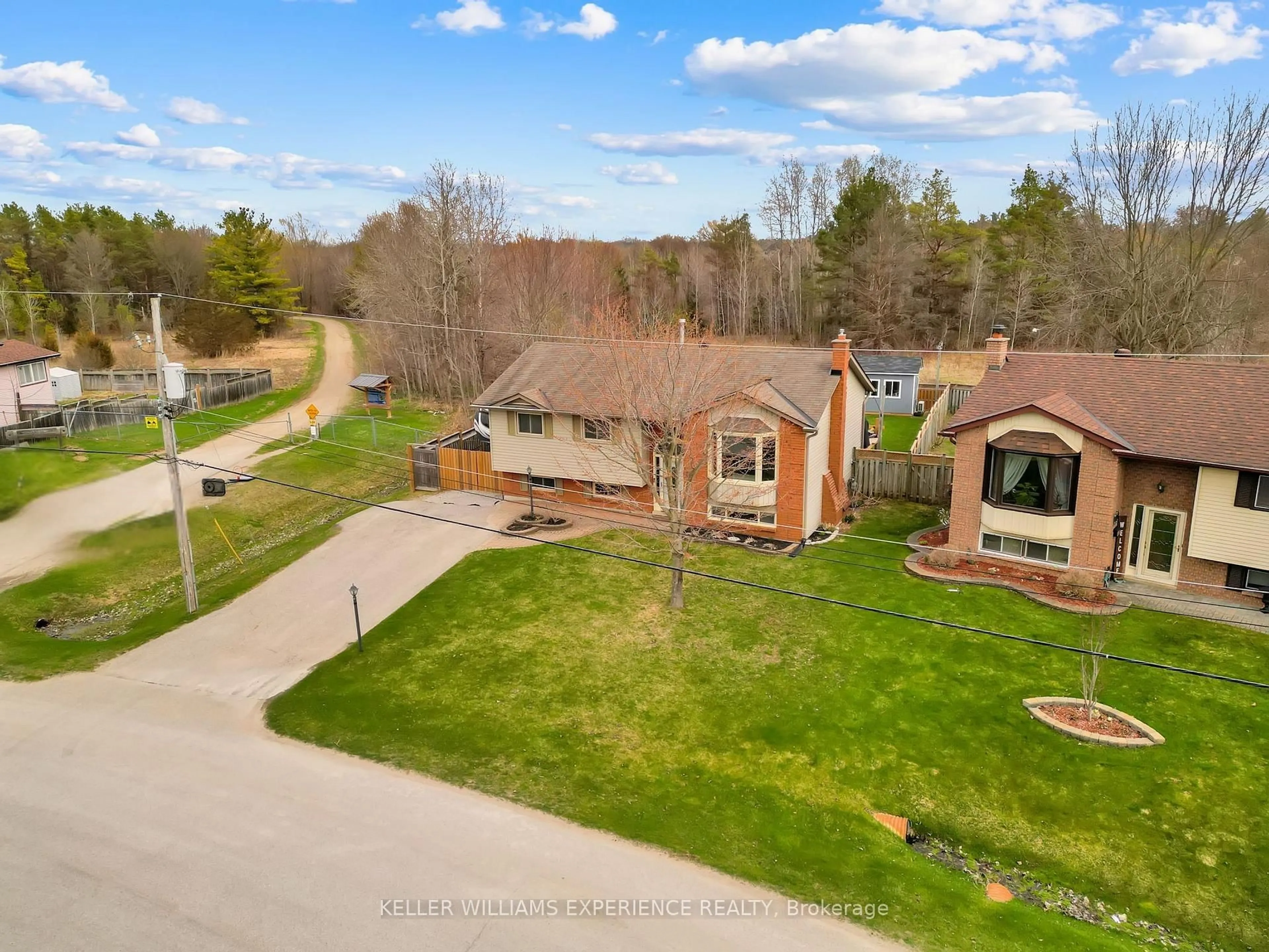 A pic from outside/outdoor area/front of a property/back of a property/a pic from drone, street for 52 ROTH St, Essa Ontario L3W 0G7