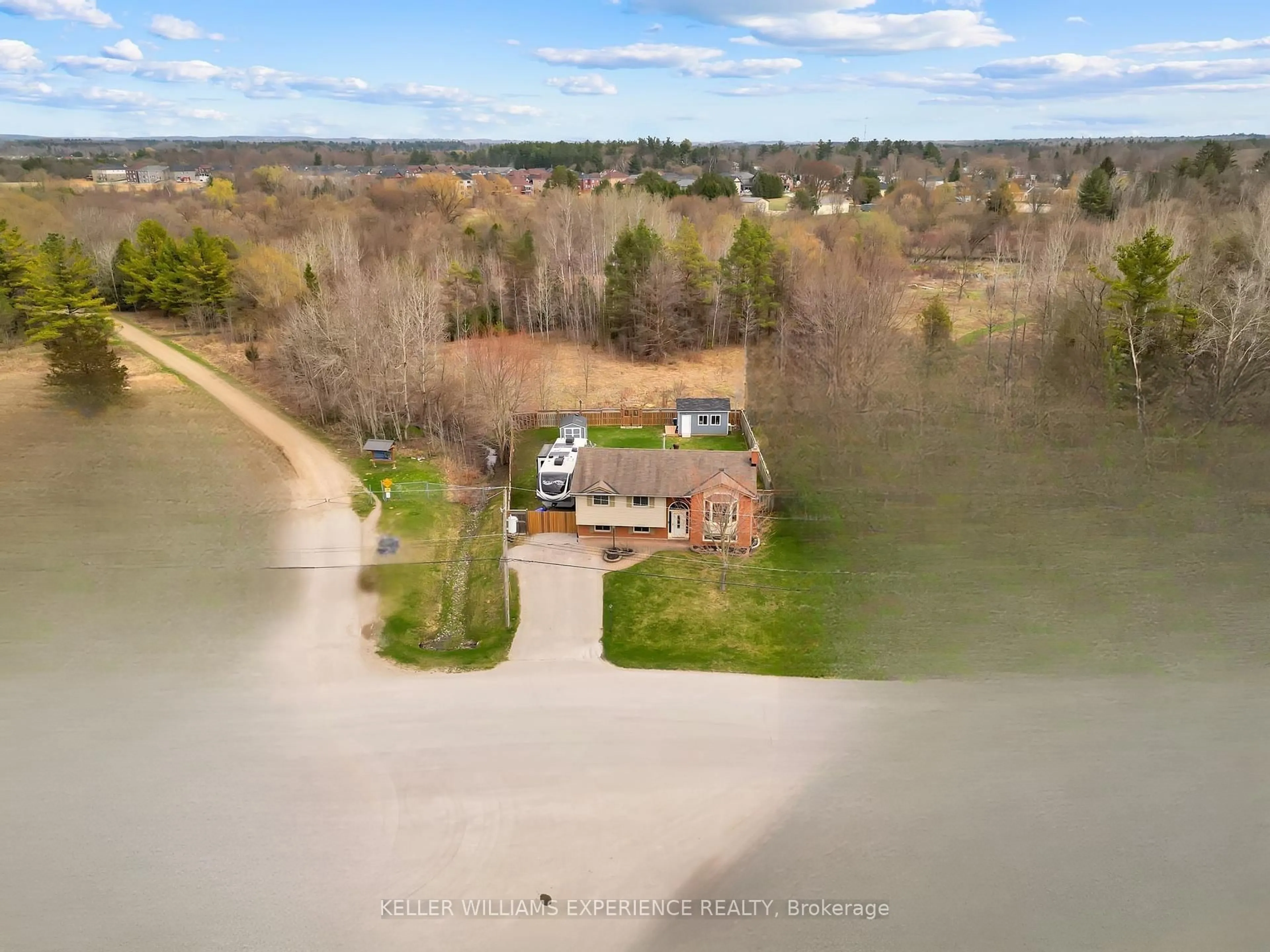 A pic from outside/outdoor area/front of a property/back of a property/a pic from drone, water/lake/river/ocean view for 52 ROTH St, Essa Ontario L3W 0G7