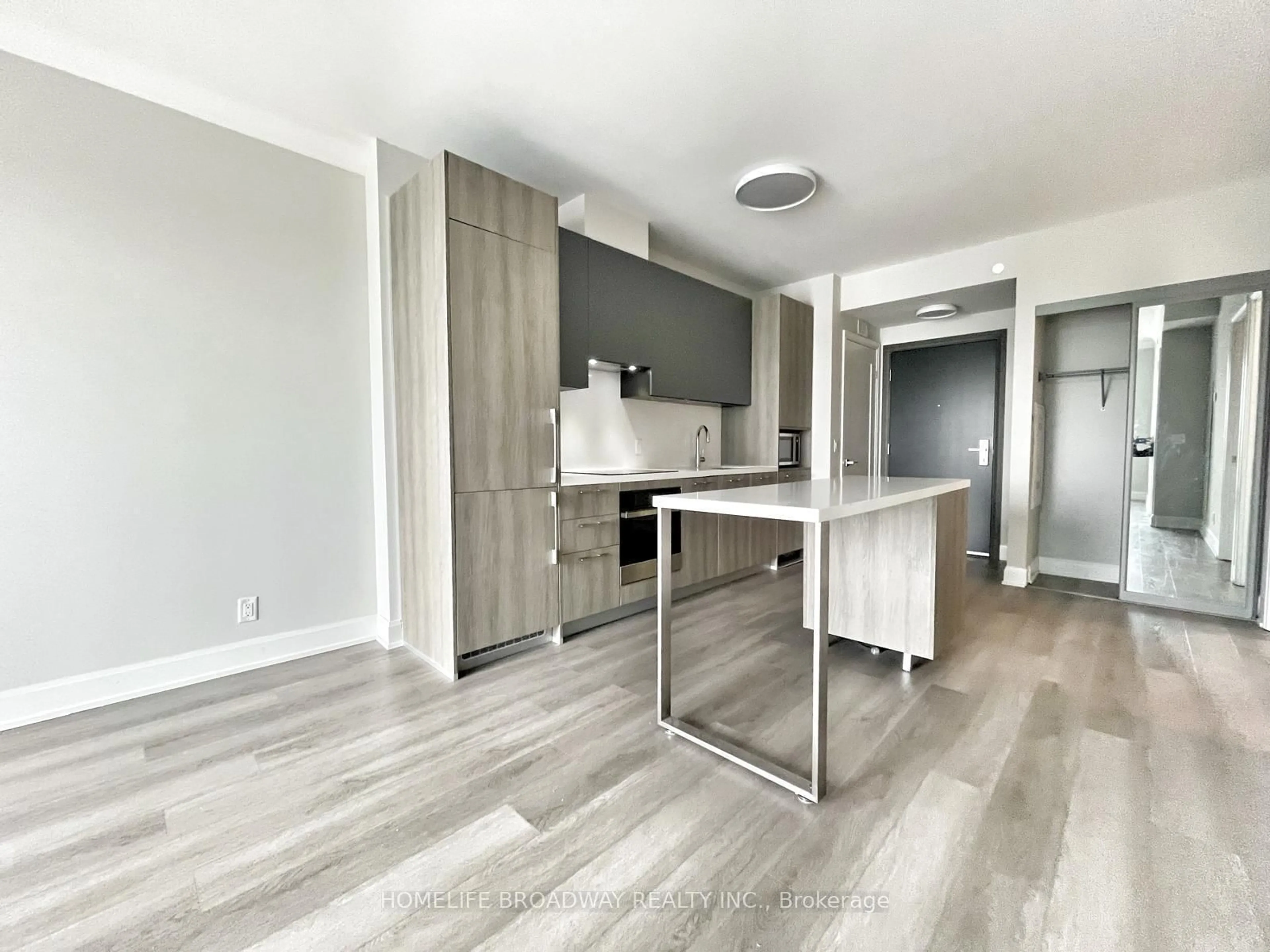 Open concept kitchen, wood/laminate floor for 8 Water Walk Dr #2809, Markham Ontario L3R 6L4