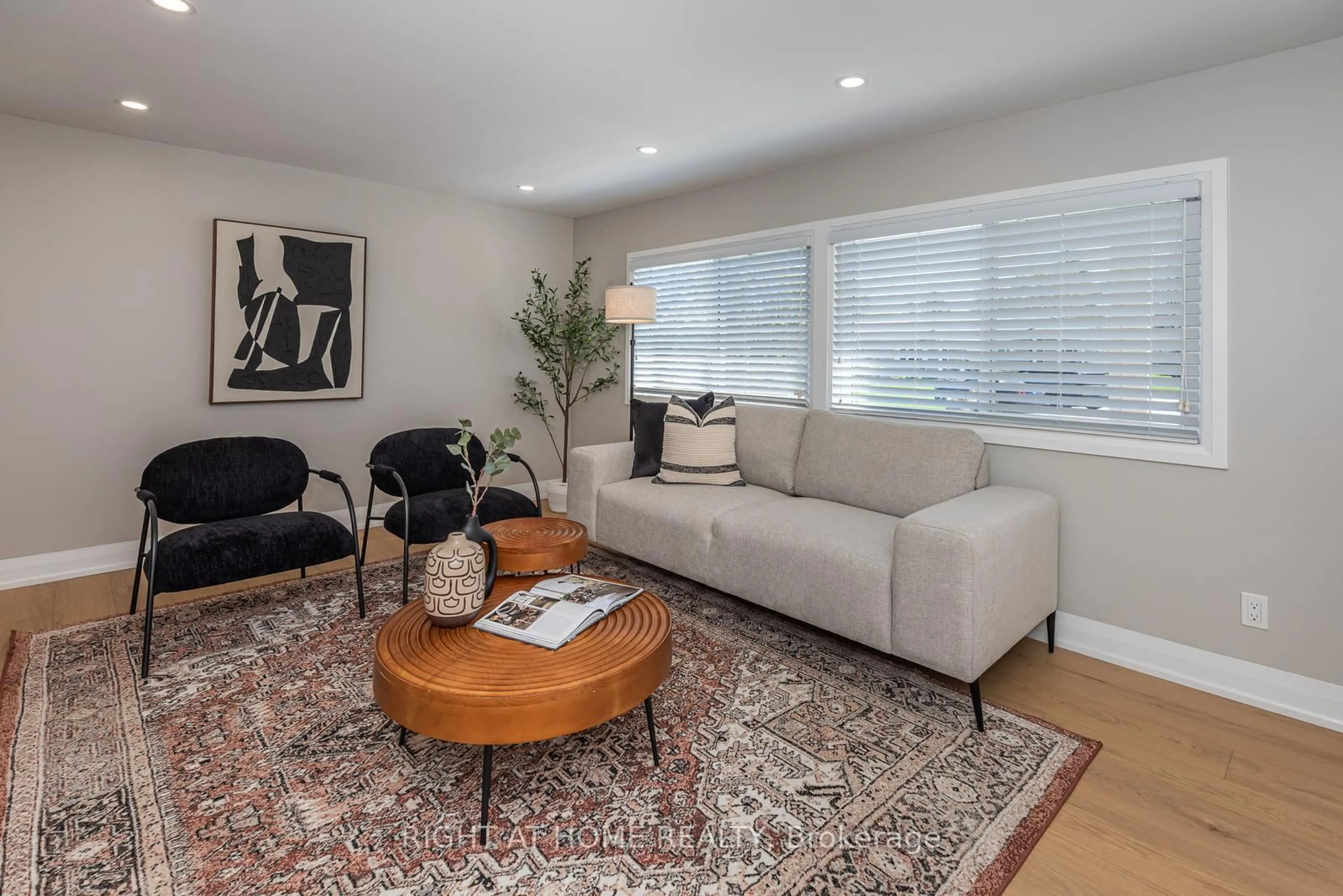 Living room with furniture, unknown for 83 Hawthorne Dr, Innisfil Ontario L9S 1N9