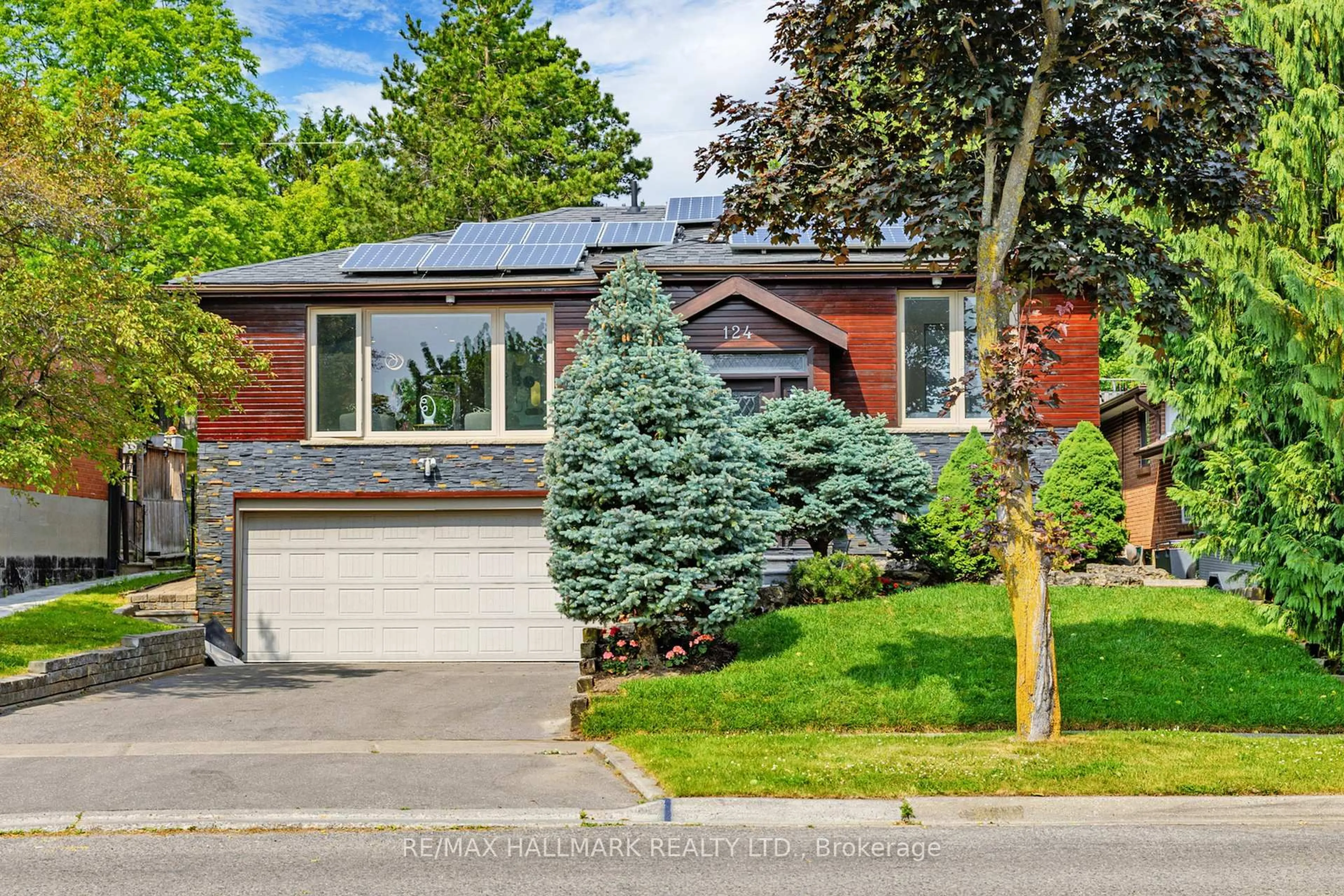 Home with brick exterior material, street for 124 Kirk Dr, Markham Ontario L3T 3L4