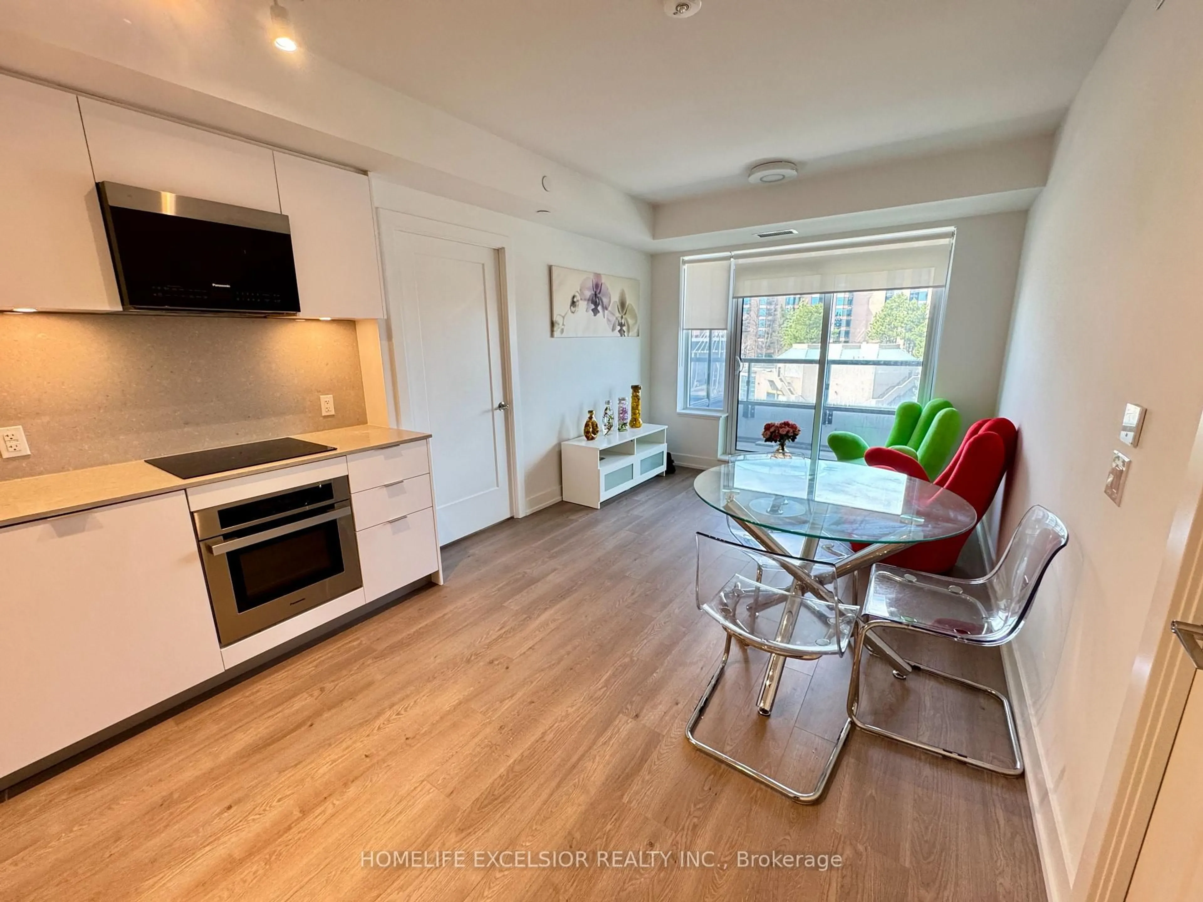 Open concept kitchen, wood/laminate floor for 9 Clegg Rd #711, Markham Ontario L6G 0B2