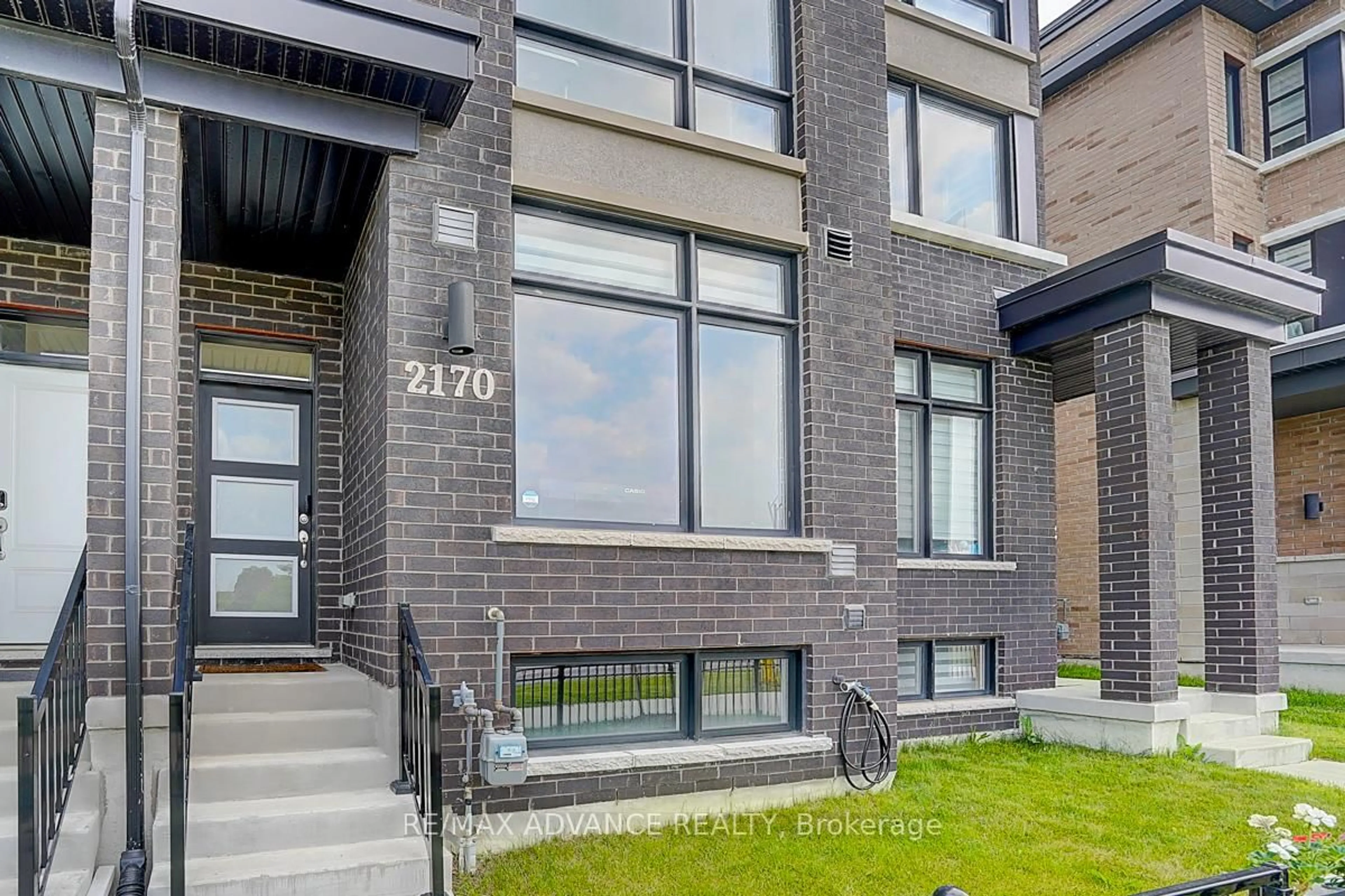 Home with brick exterior material, street for 2170 Donald Cousens Pkwy, Markham Ontario L6B 1N9