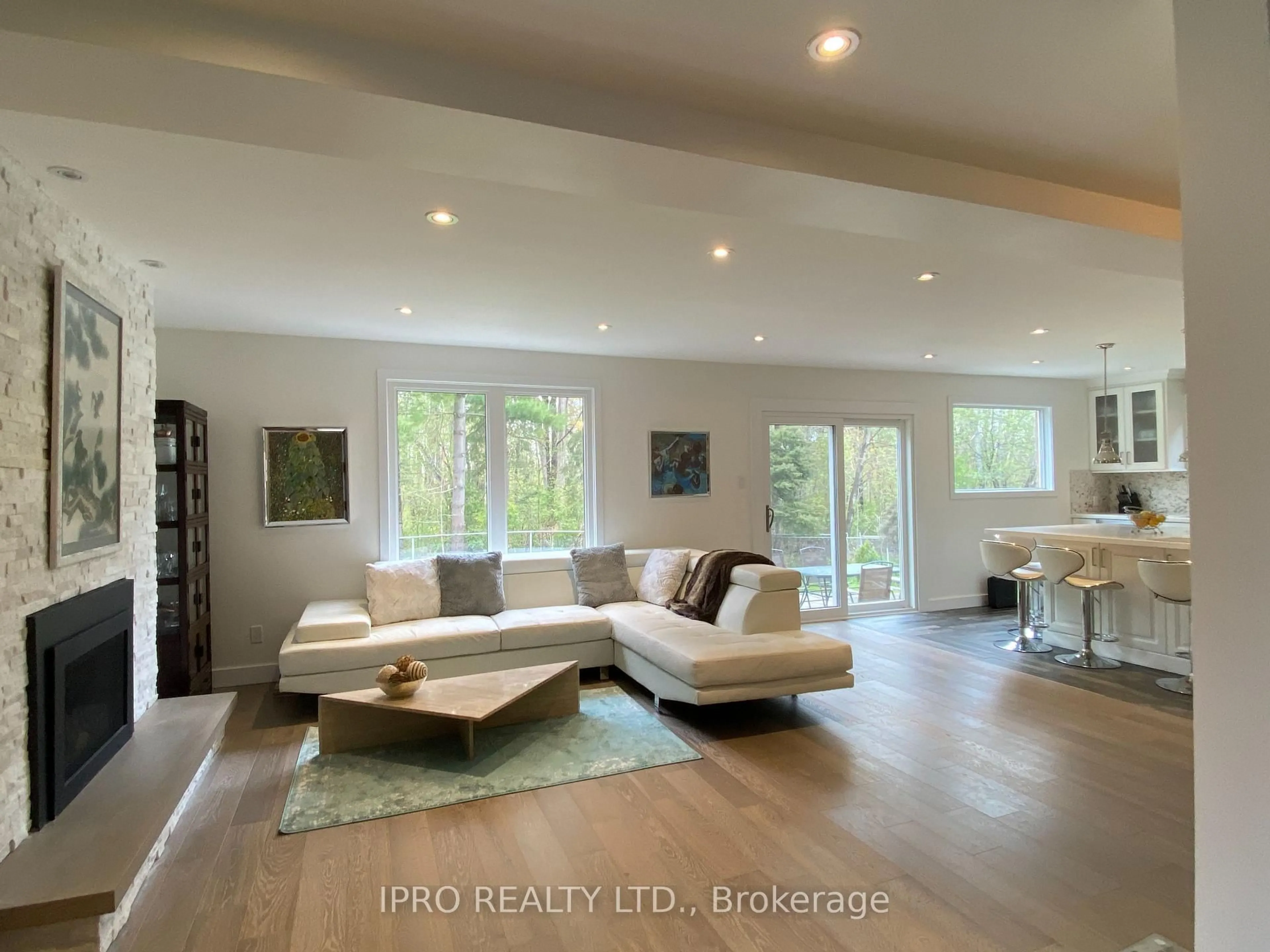 Living room with furniture, wood/laminate floor for 324 Airdrie Dr, Vaughan Ontario L4L 3B9