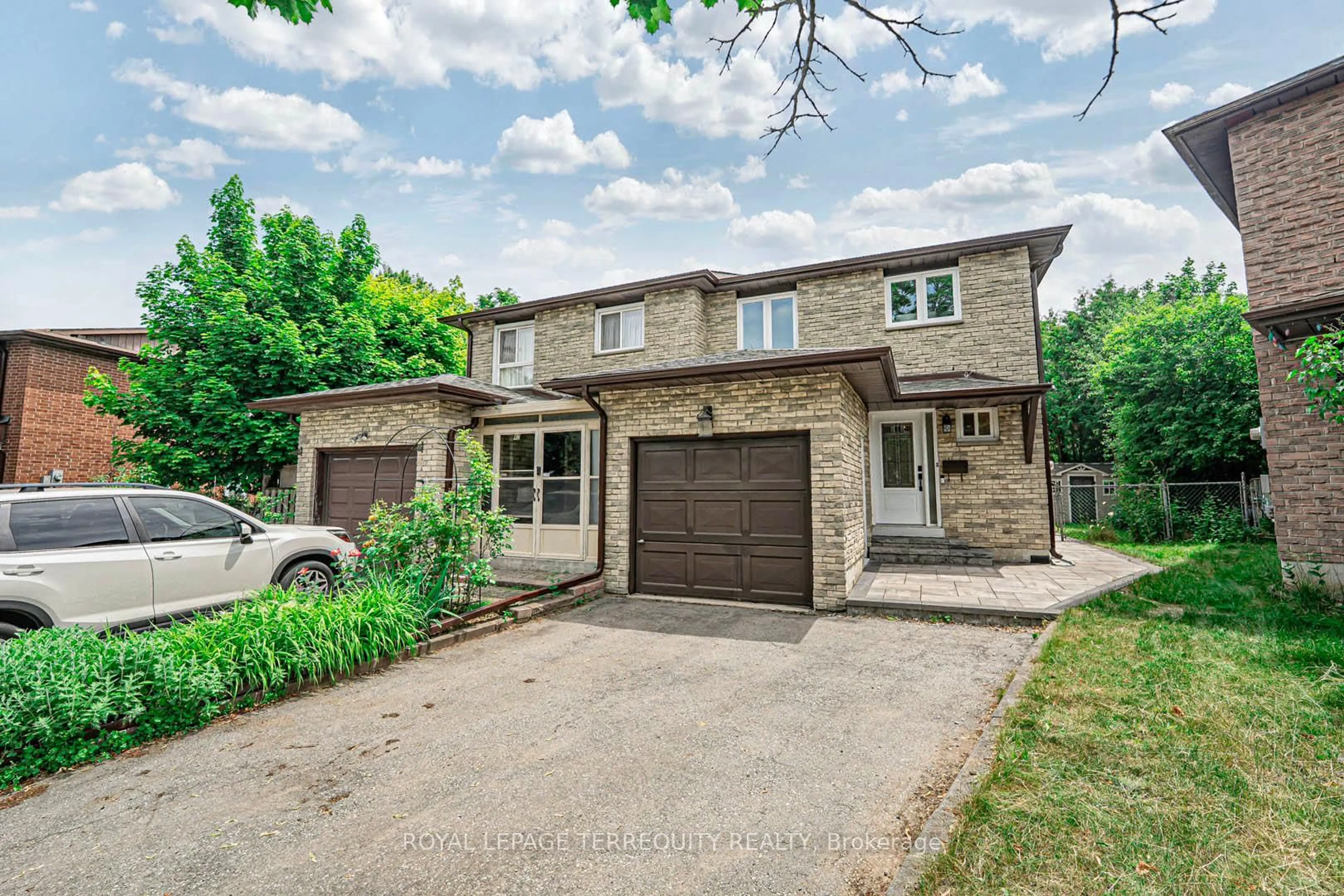 Home with brick exterior material, street for 40 Pepperell Cres, Markham Ontario L3R 3G8