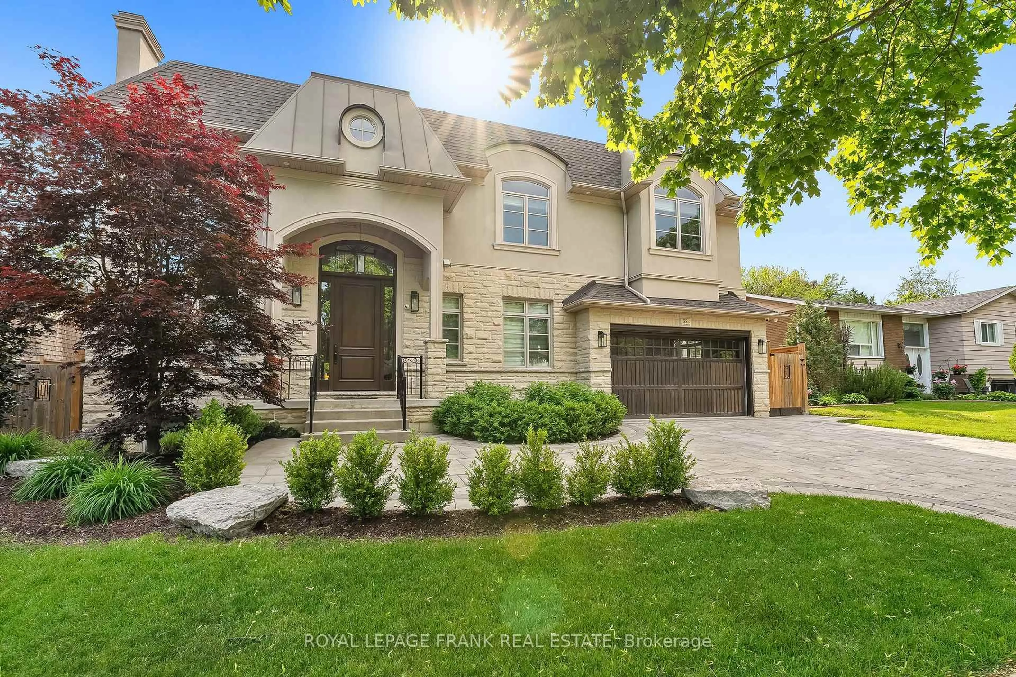 Home with brick exterior material, street for 52 Wootten Way, Markham Ontario L3P 2Y4