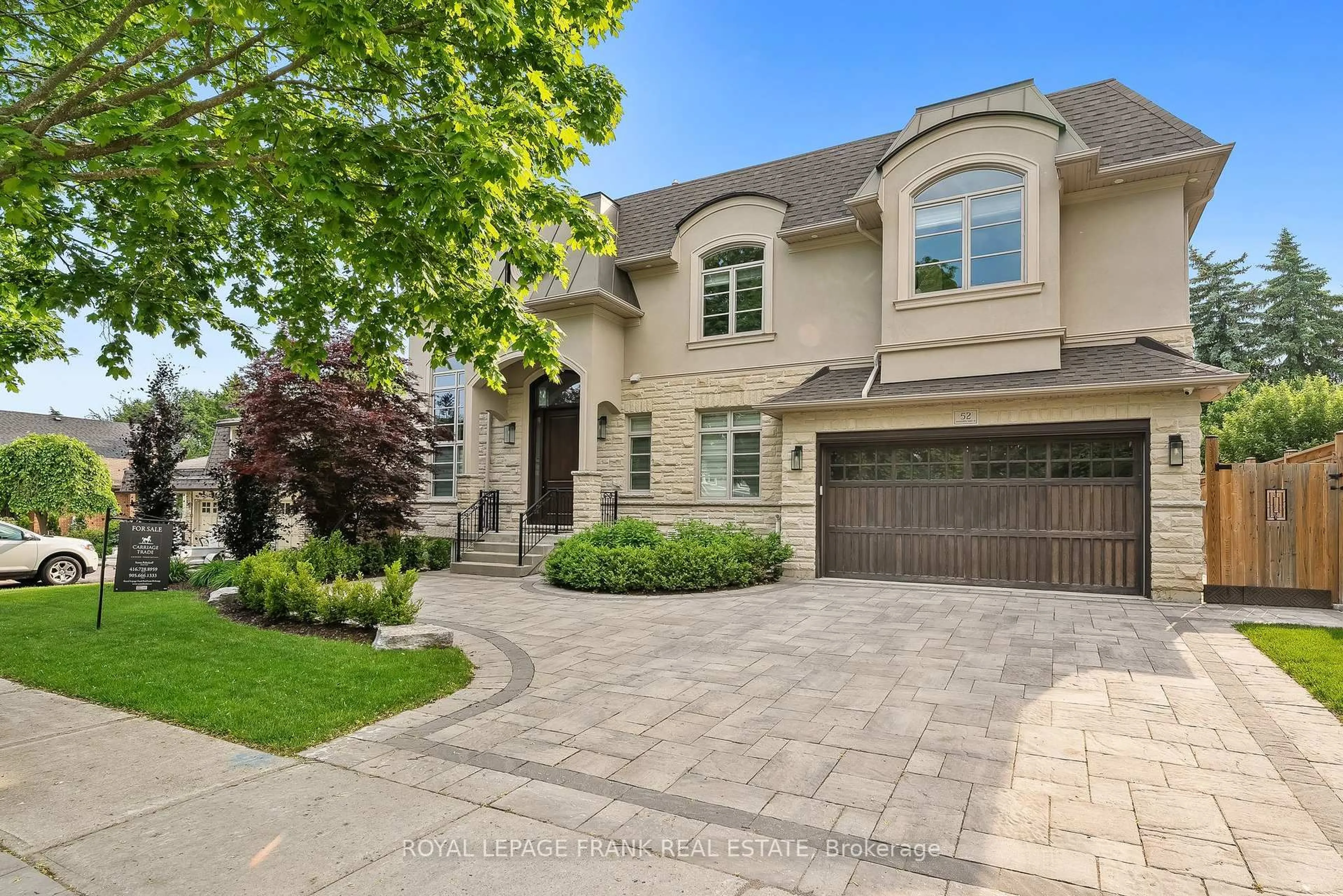 Home with brick exterior material, street for 52 Wootten Way, Markham Ontario L3P 2Y4