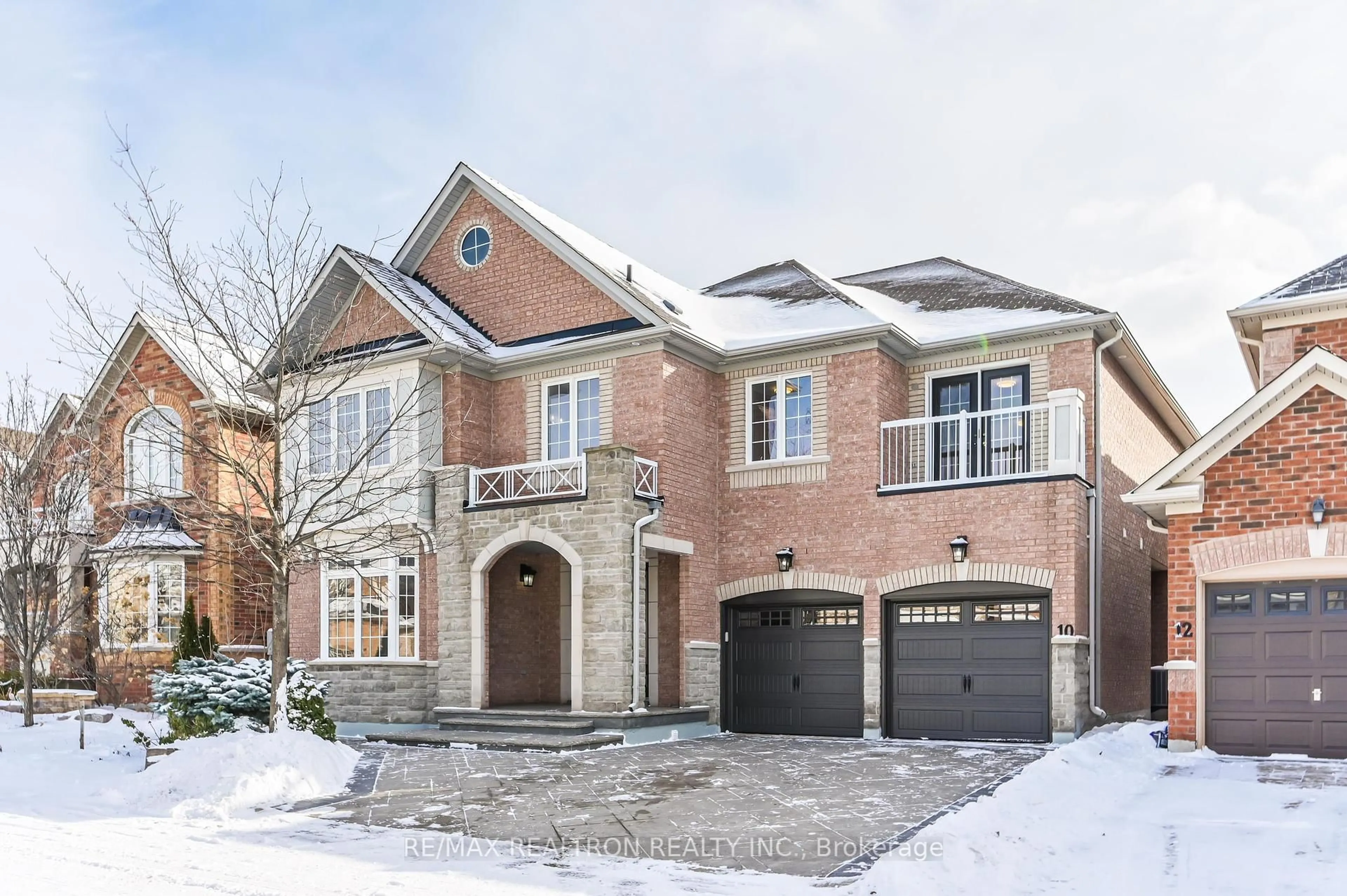 Home with brick exterior material, street for 10 Golden Meadow Dr, Markham Ontario L6E 1V8