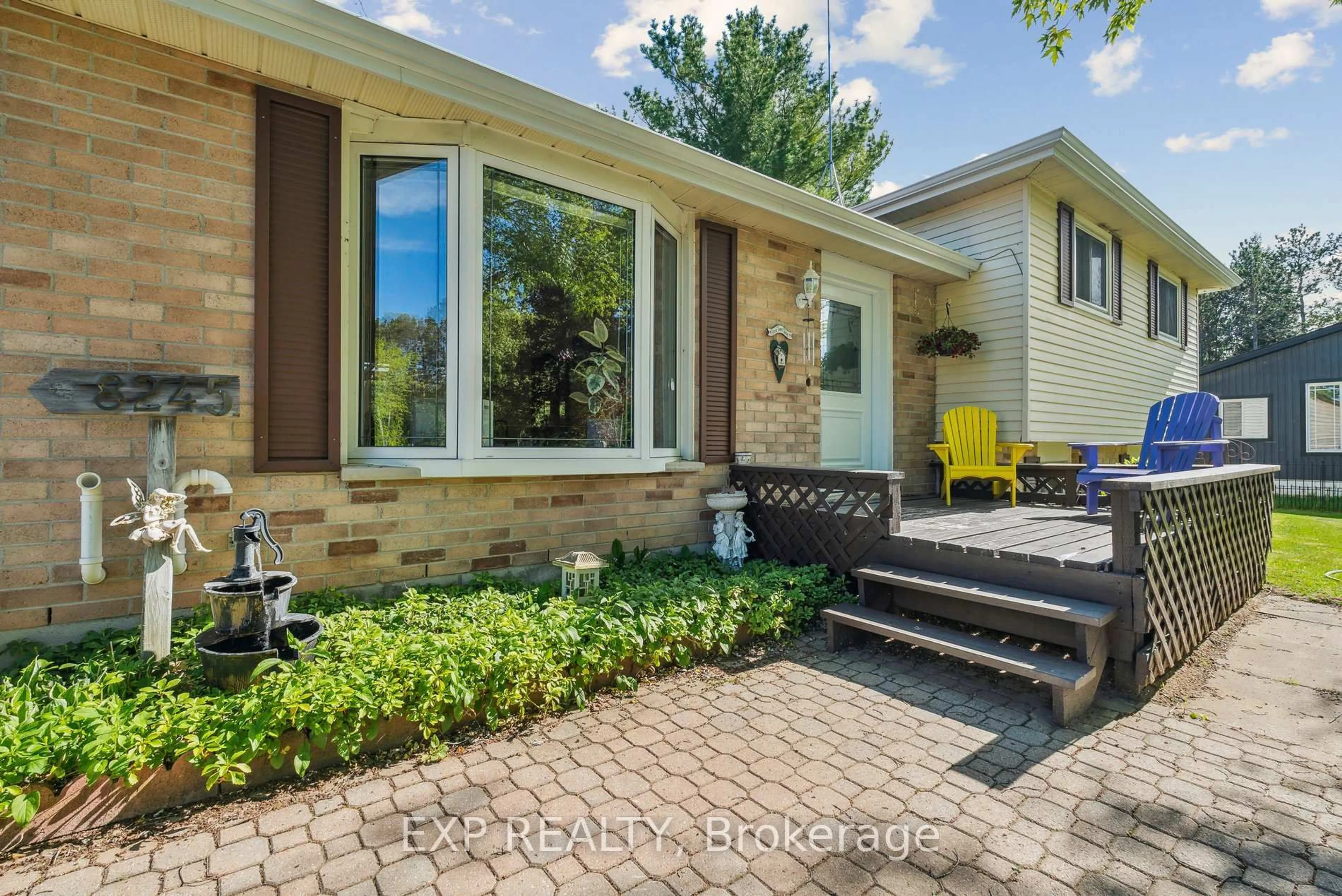 Home with brick exterior material, street for 8245 Main St, Adjala-Tosorontio Ontario L0M 1M0