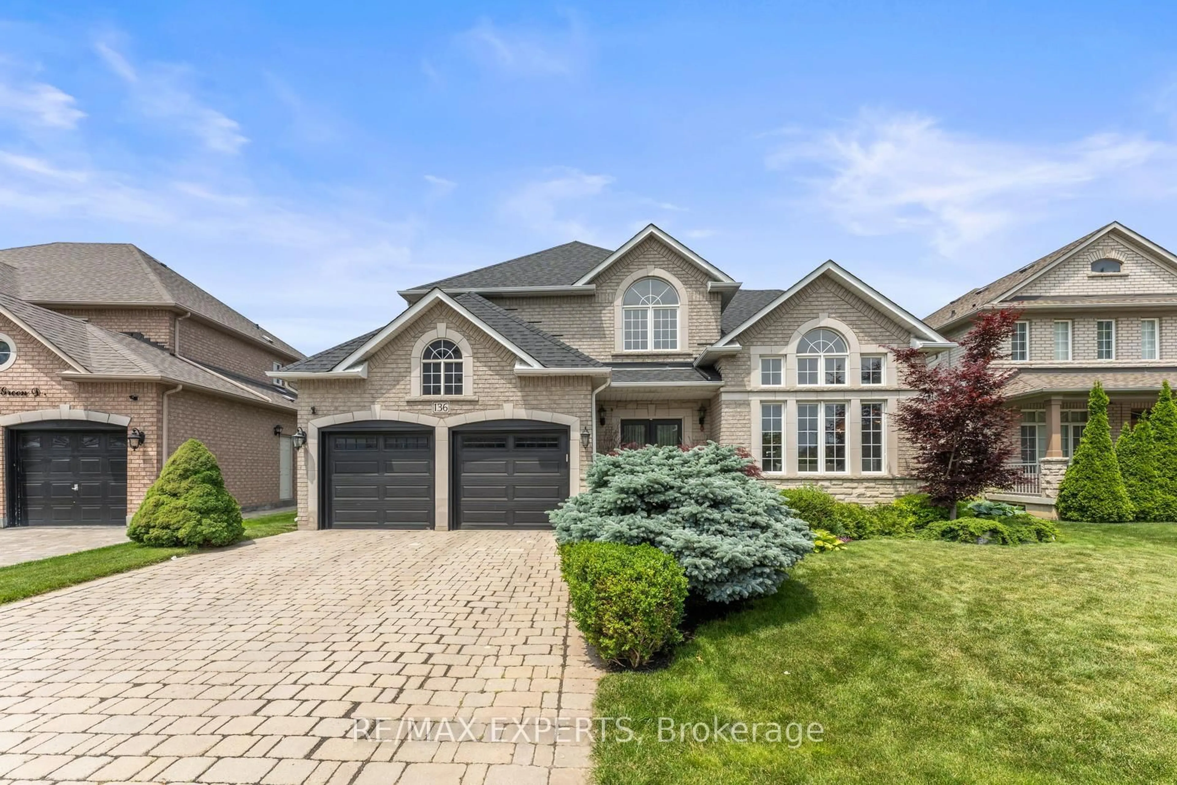 Home with brick exterior material, street for 136 Village Green Dr, Vaughan Ontario L4L 9G9
