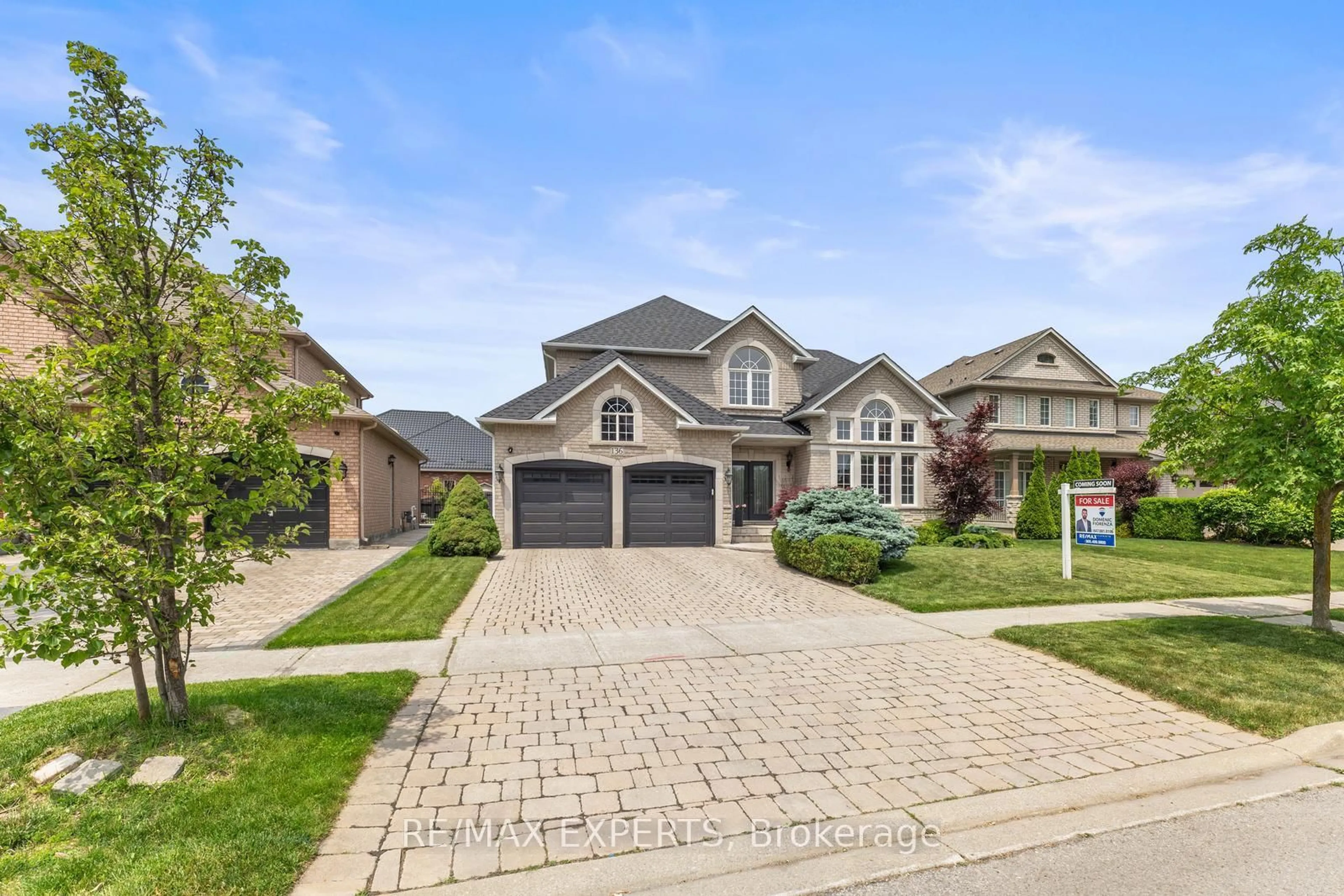 Home with brick exterior material, street for 136 Village Green Dr, Vaughan Ontario L4L 9G9