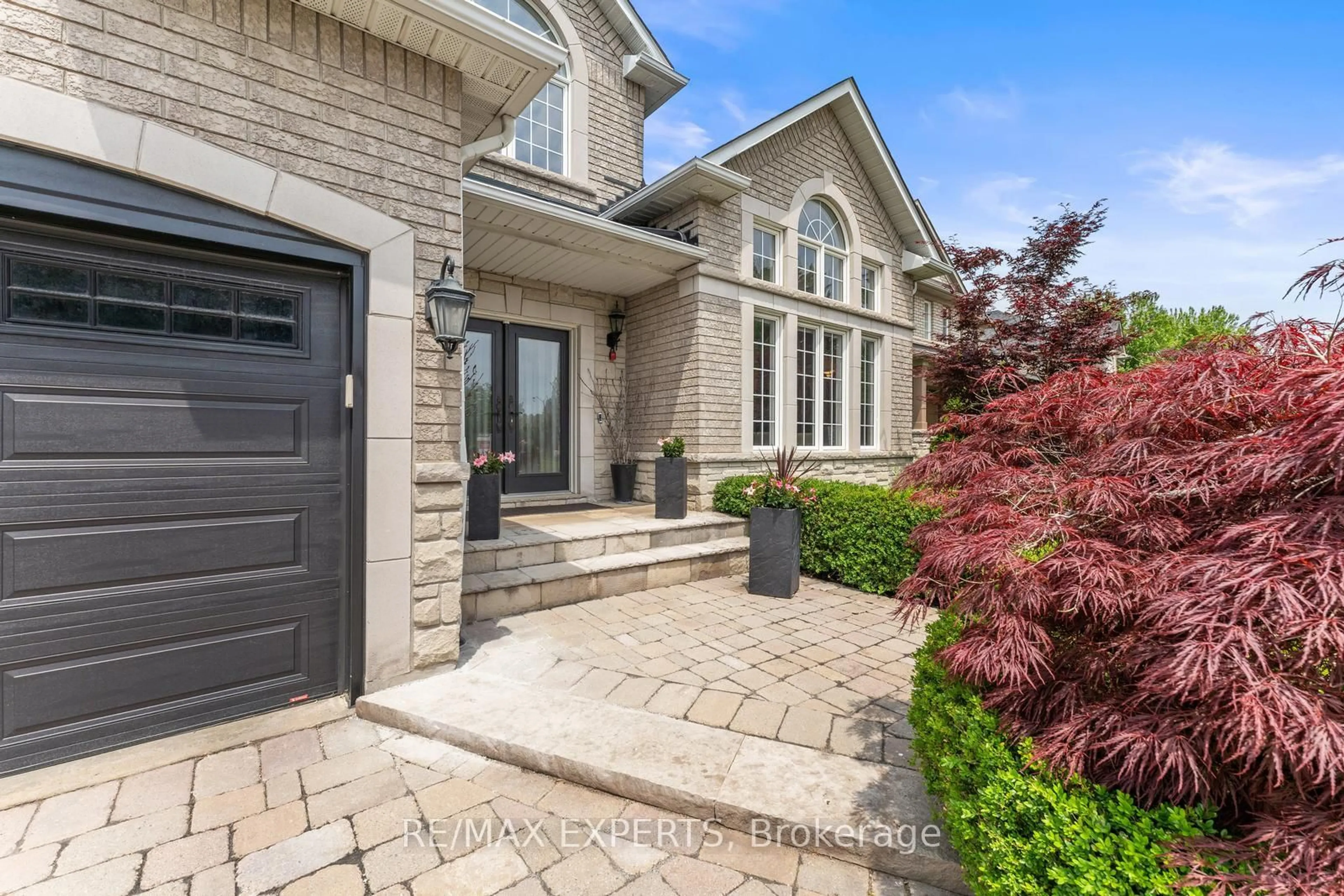 Home with brick exterior material, street for 136 Village Green Dr, Vaughan Ontario L4L 9G9