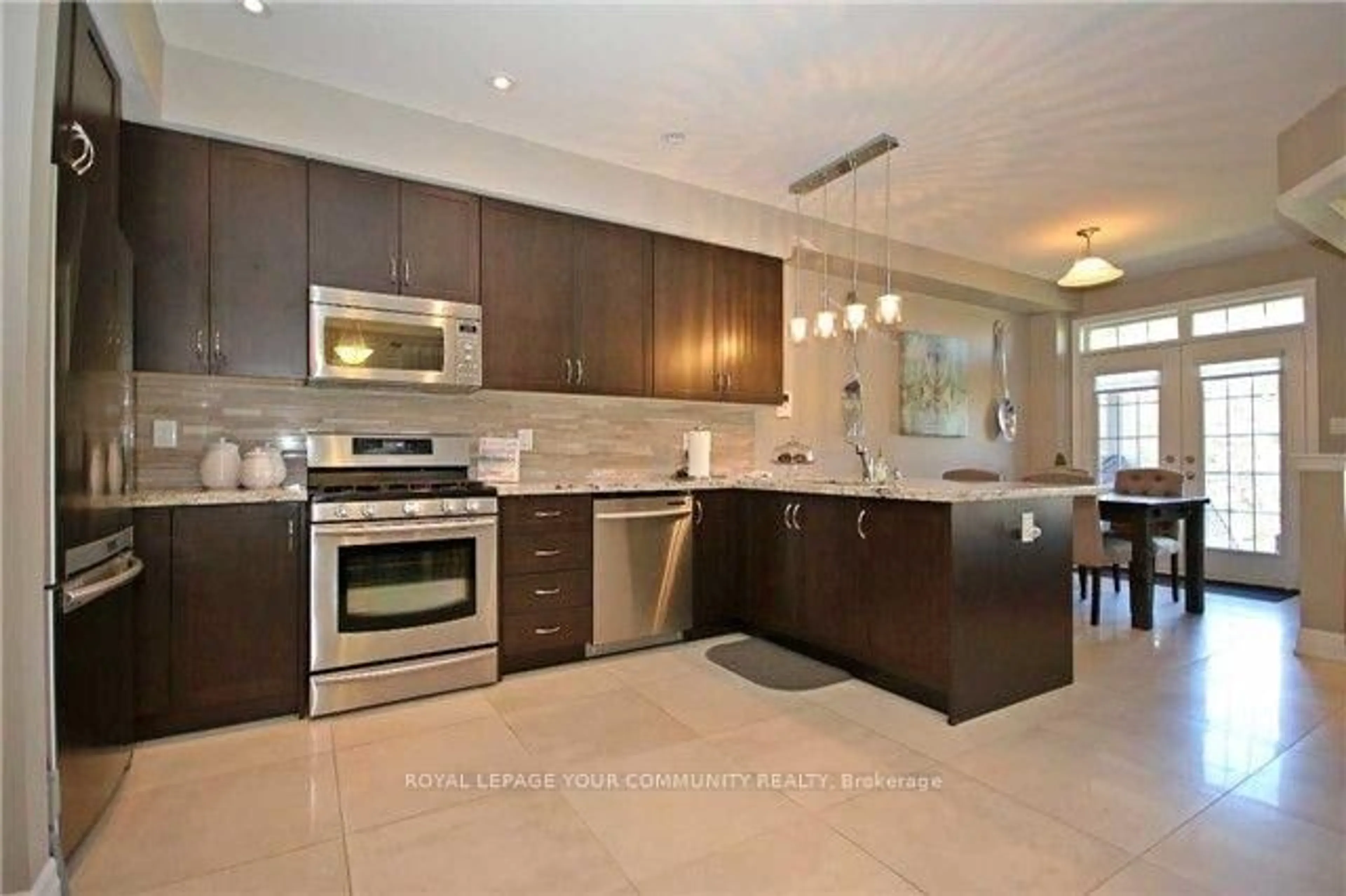 Open concept kitchen, ceramic/tile floor for 86 Alex Campbell Cres, King Ontario L7B 1K9