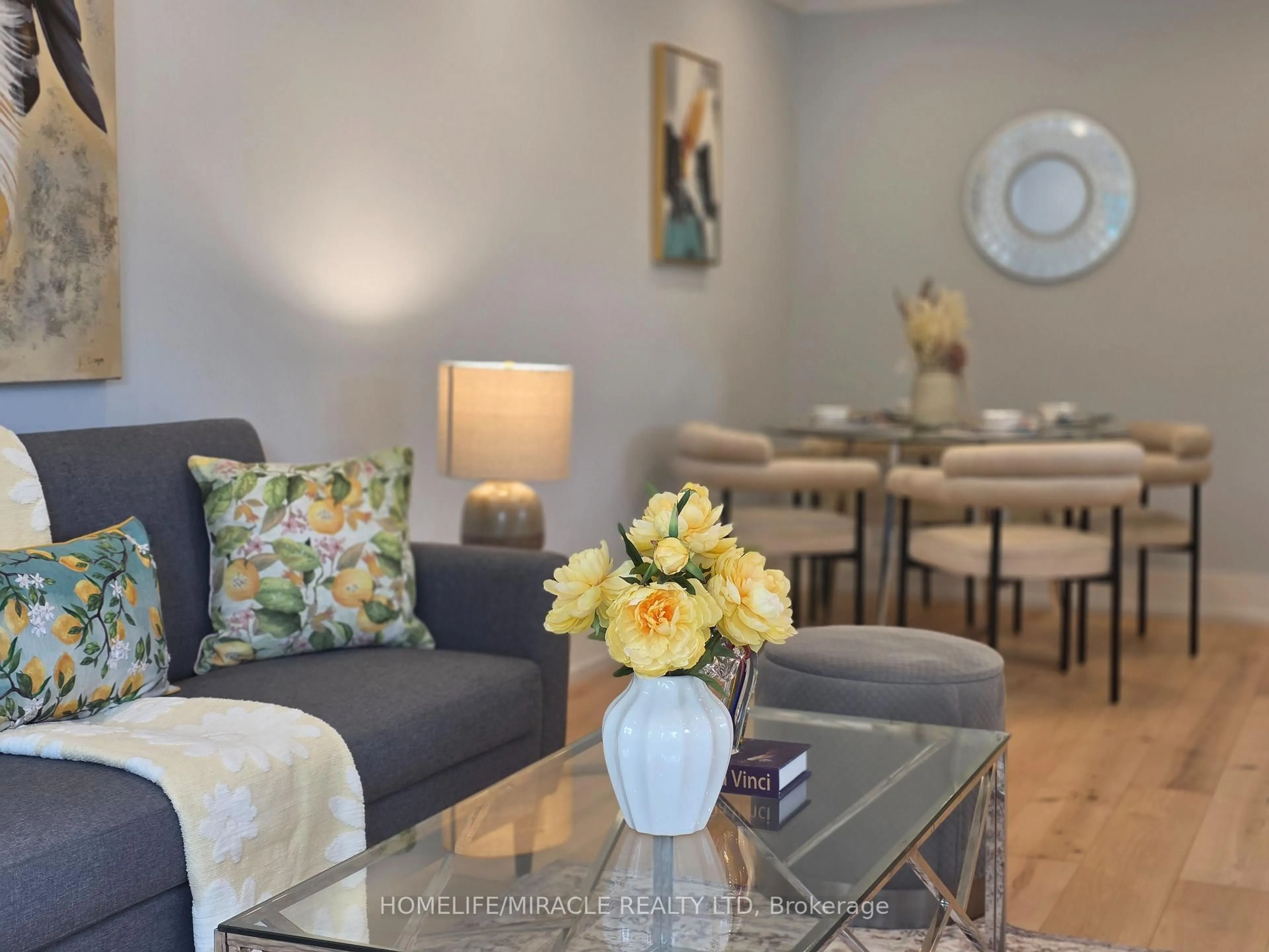 Living room with furniture, wood/laminate floor for 276 Penn Ave, Newmarket Ontario L3Y 2S6