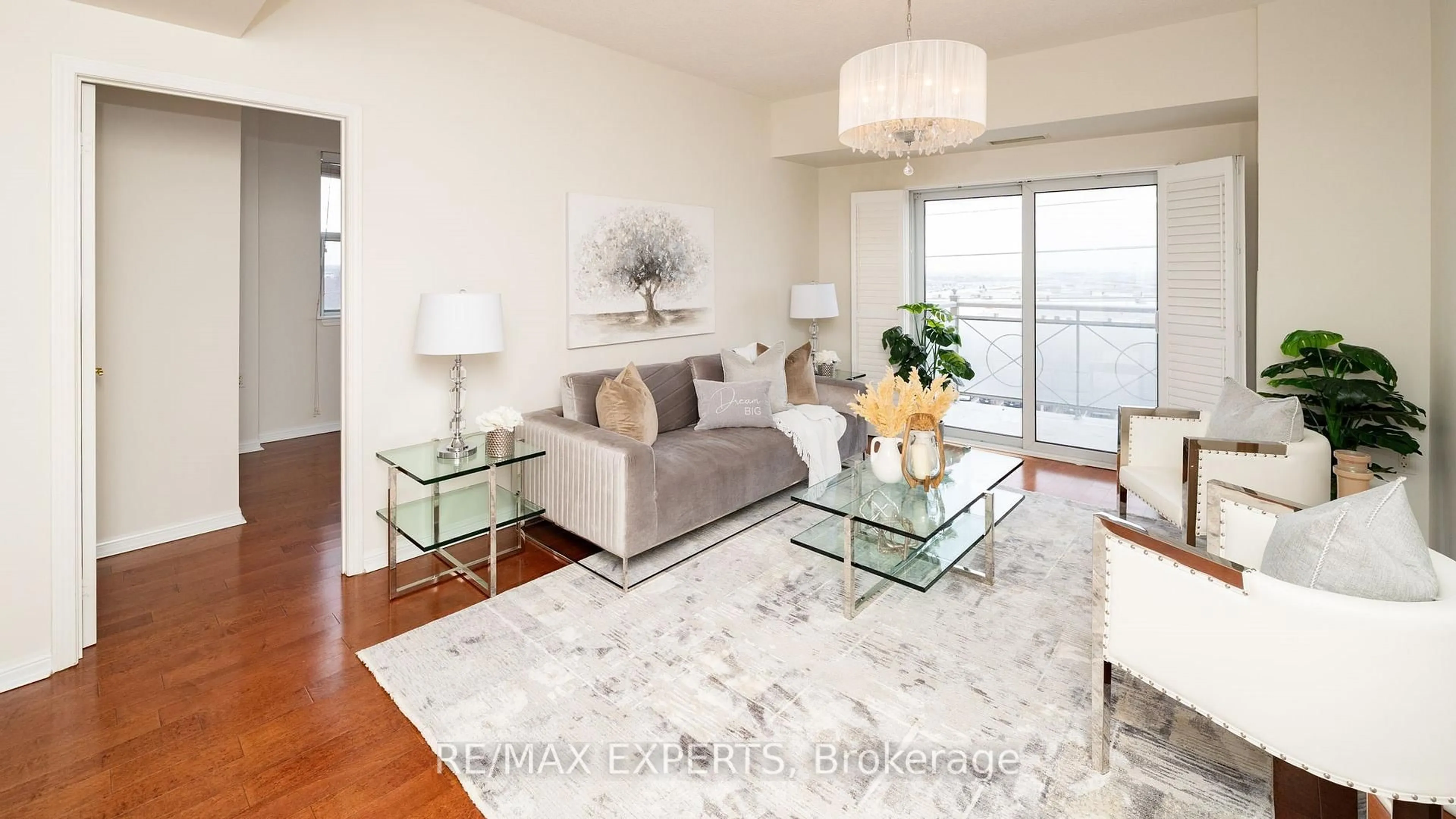 Living room with furniture, wood/laminate floor for 2500 Rutherford Rd #Unit 516, Vaughan Ontario L4K 5N7