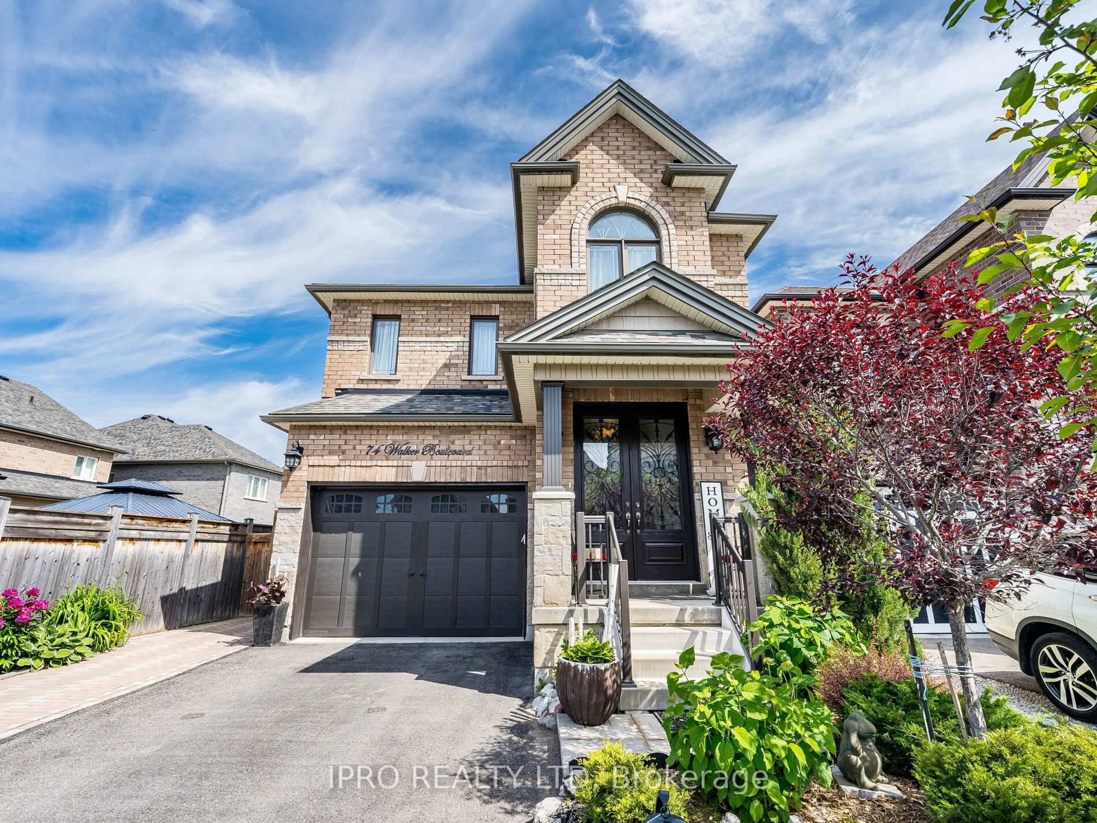 Home with brick exterior material, street for 74 Walker Blvd, New Tecumseth Ontario L9R 0N3