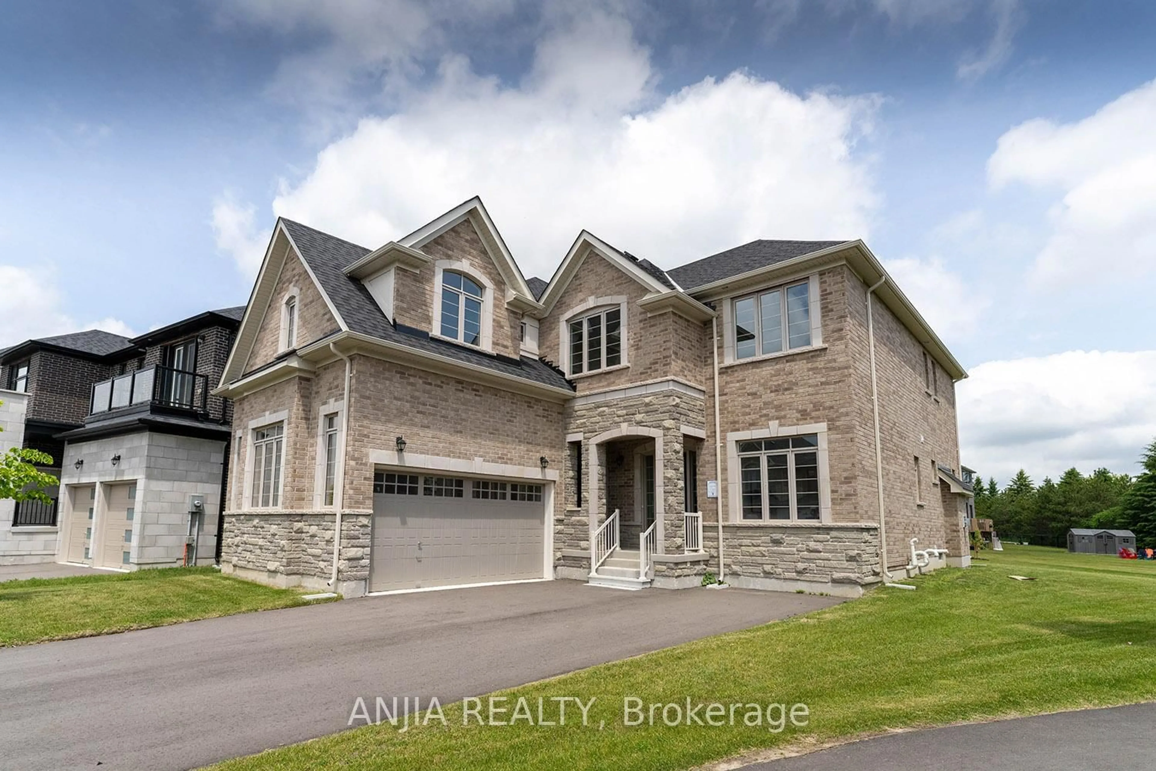 Home with brick exterior material, street for 21 Joiner Circ, Whitchurch-Stouffville Ontario L4A 4W9