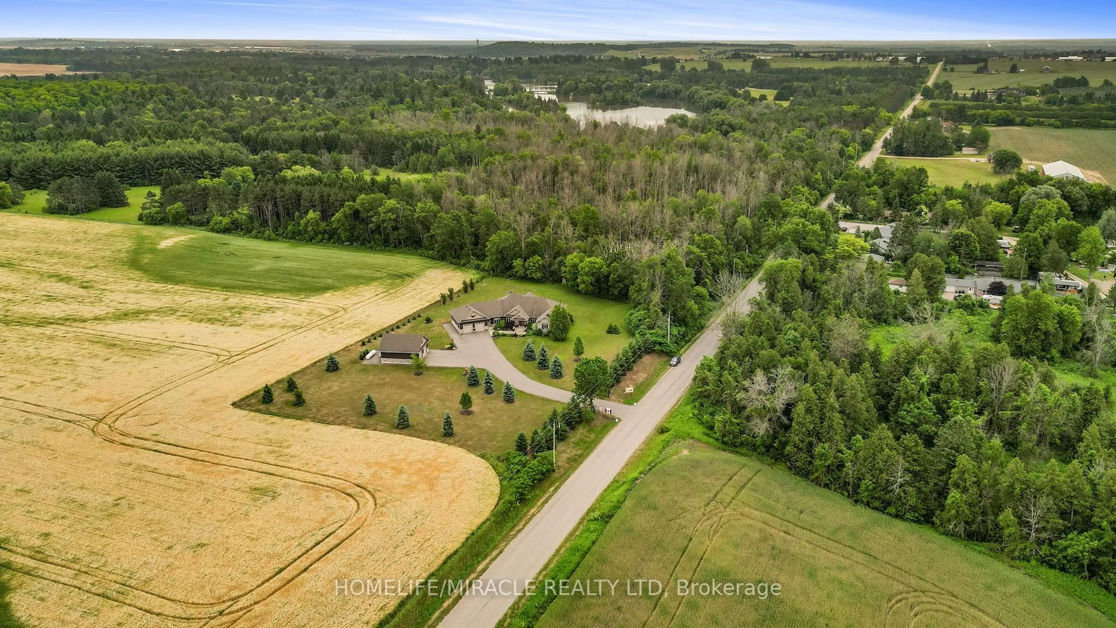 A pic from outside/outdoor area/front of a property/back of a property/a pic from drone, water/lake/river/ocean view for 5399 Concession Rd 6, Adjala-Tosorontio Ontario L9R 1V3