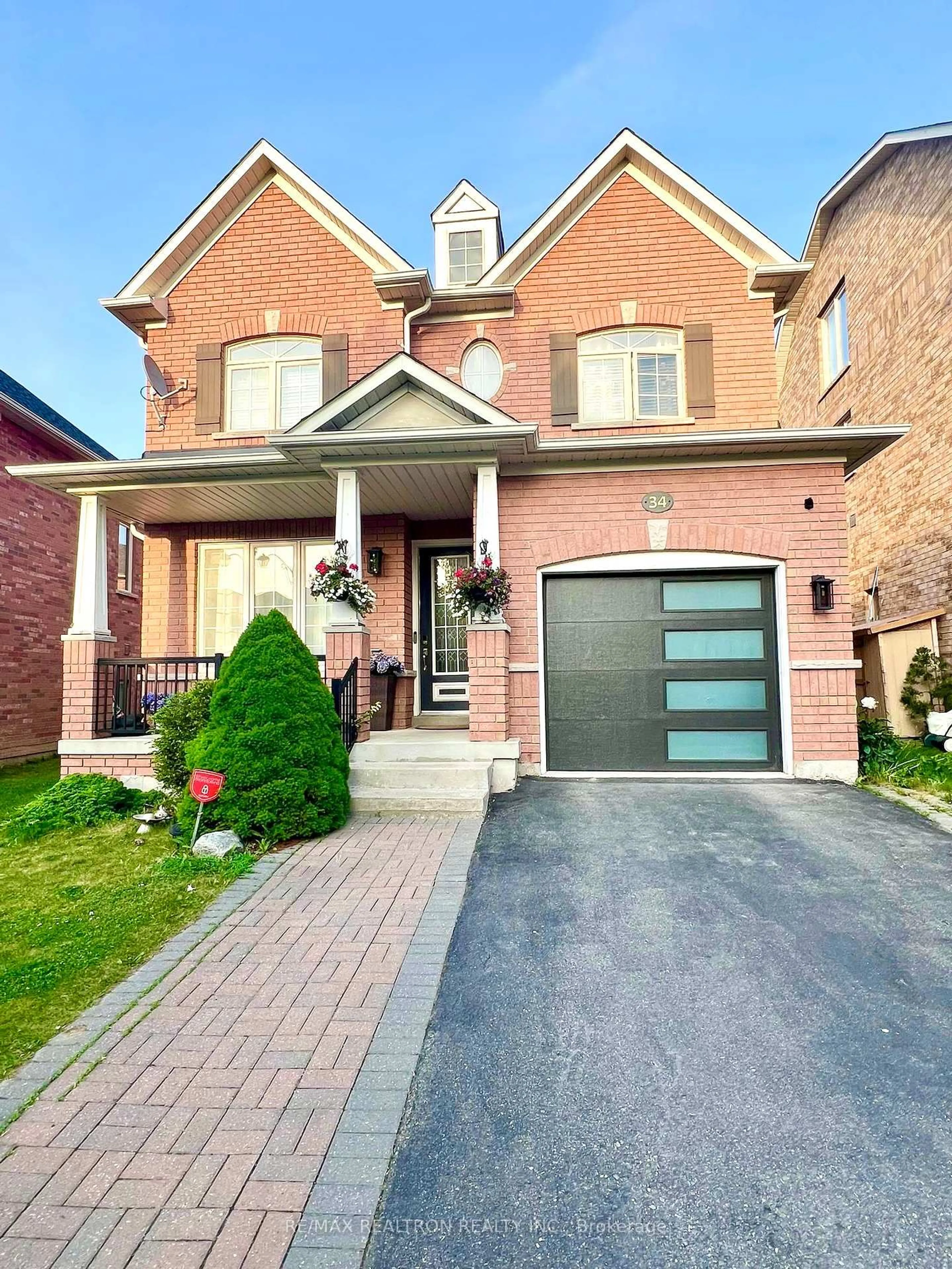 Home with brick exterior material, street for 34 Hubner Dr, Richmond Hill Ontario L4E 4W7