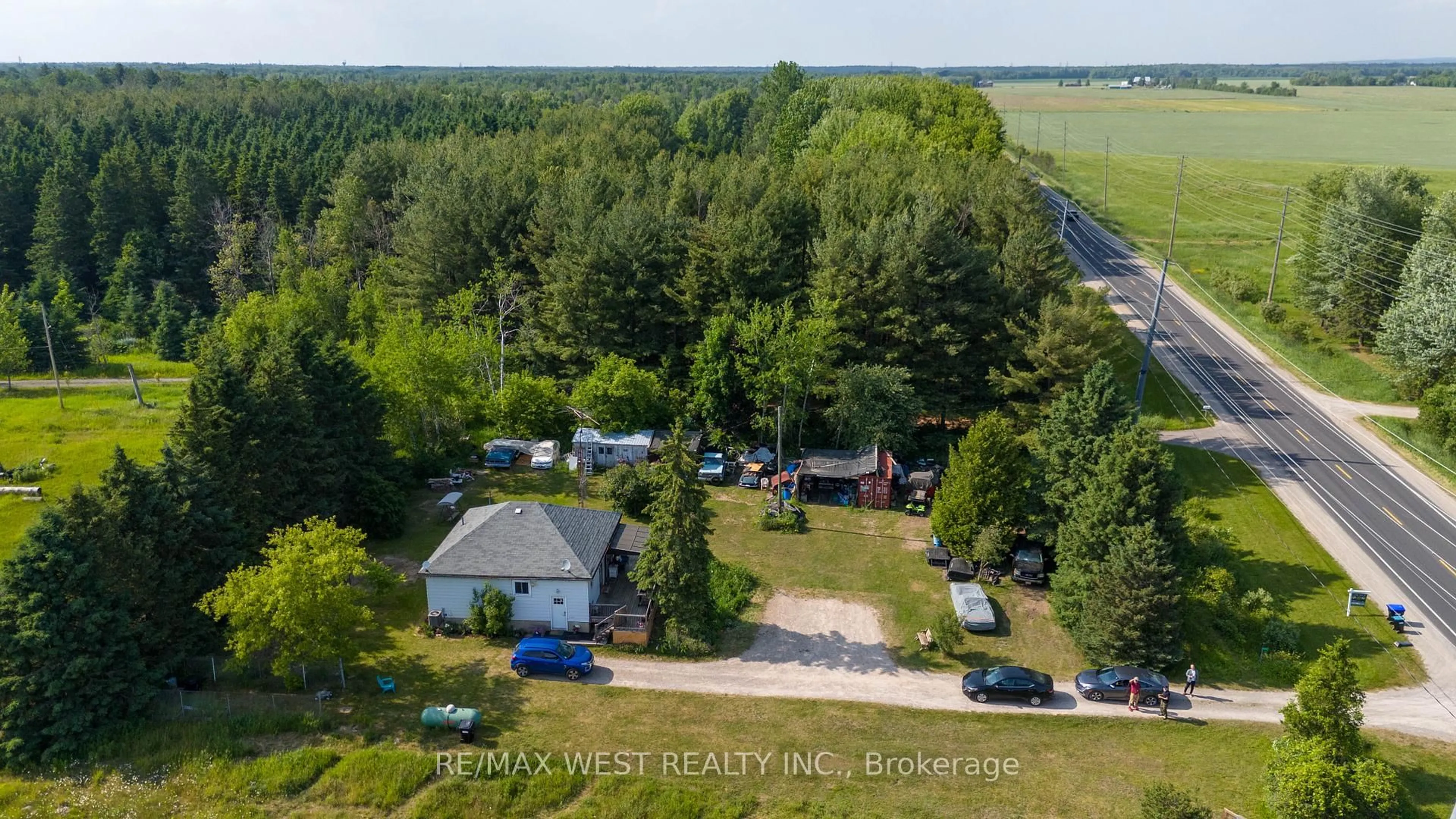 A pic from outside/outdoor area/front of a property/back of a property/a pic from drone, unknown for 6464 County Road 10 Rd, Essa Ontario L9R 1V2