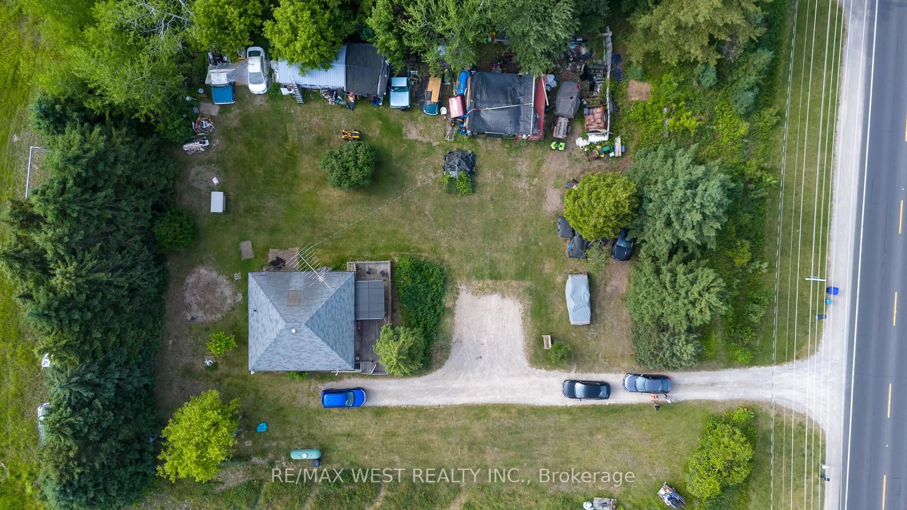 A pic from outside/outdoor area/front of a property/back of a property/a pic from drone, street for 6464 County Road 10 Rd, Essa Ontario L9R 1V2