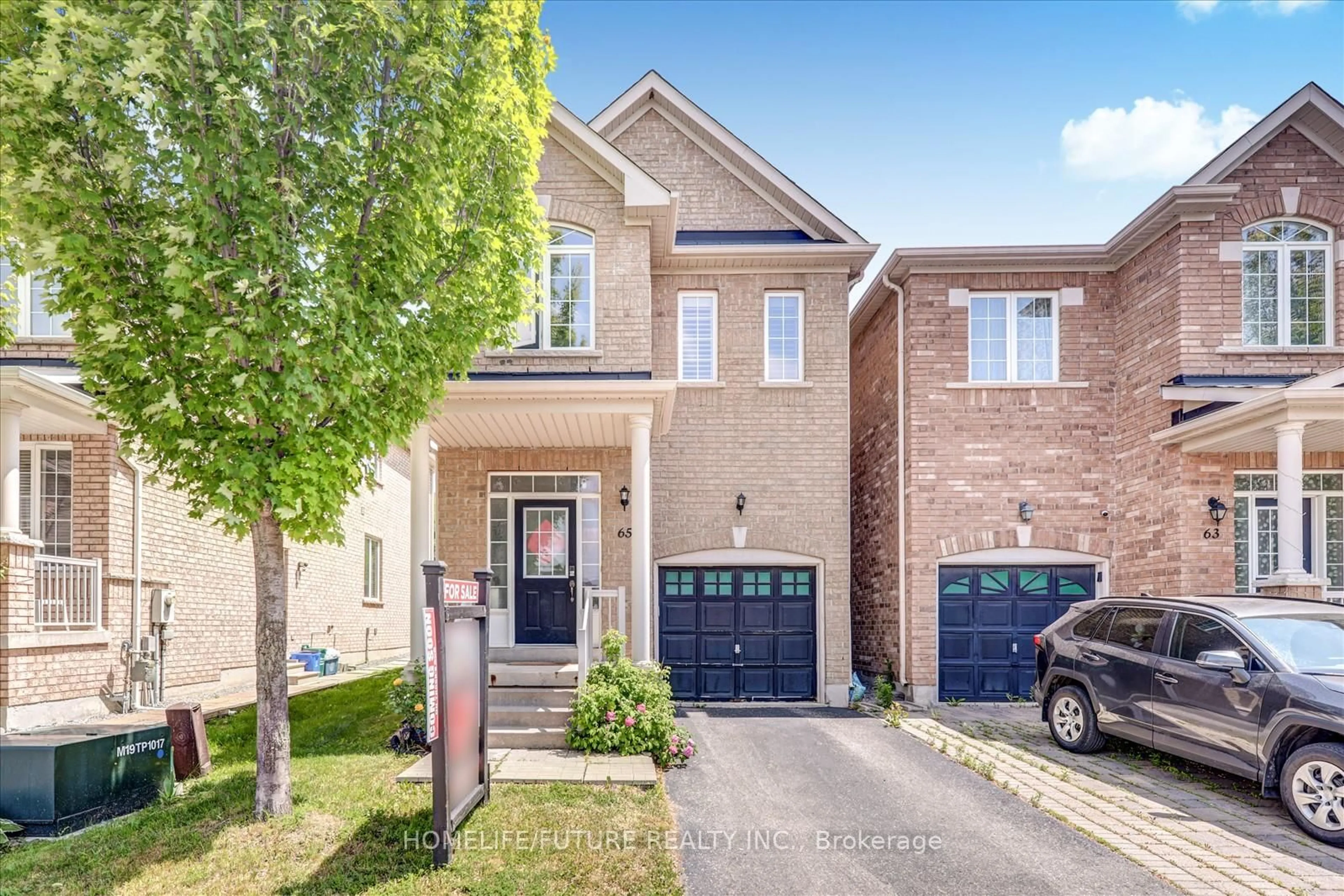 Home with brick exterior material, street for 65 Kincaid Lane, Markham Ontario L3S 0B9