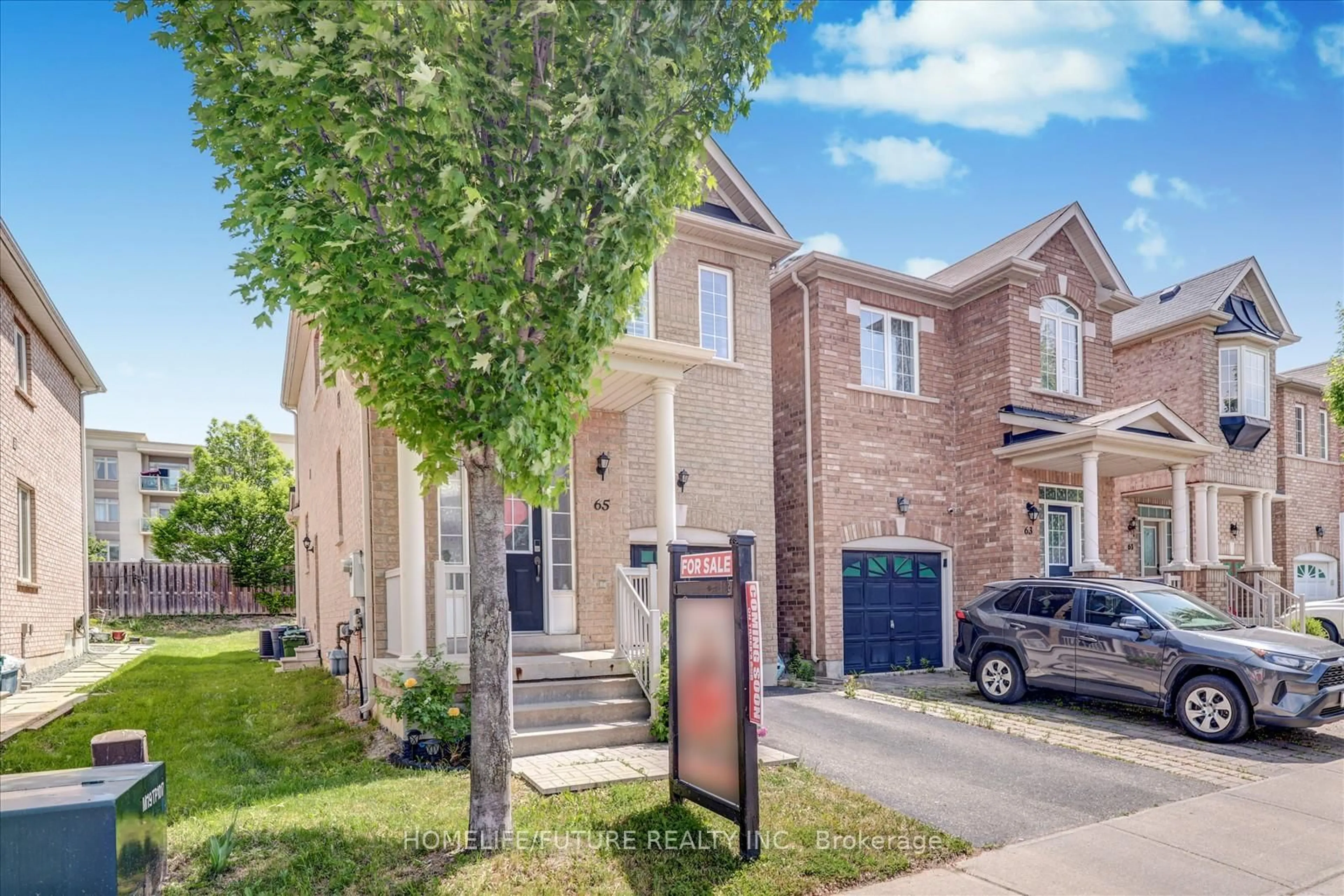 Home with brick exterior material, street for 65 Kincaid Lane, Markham Ontario L3S 0B9