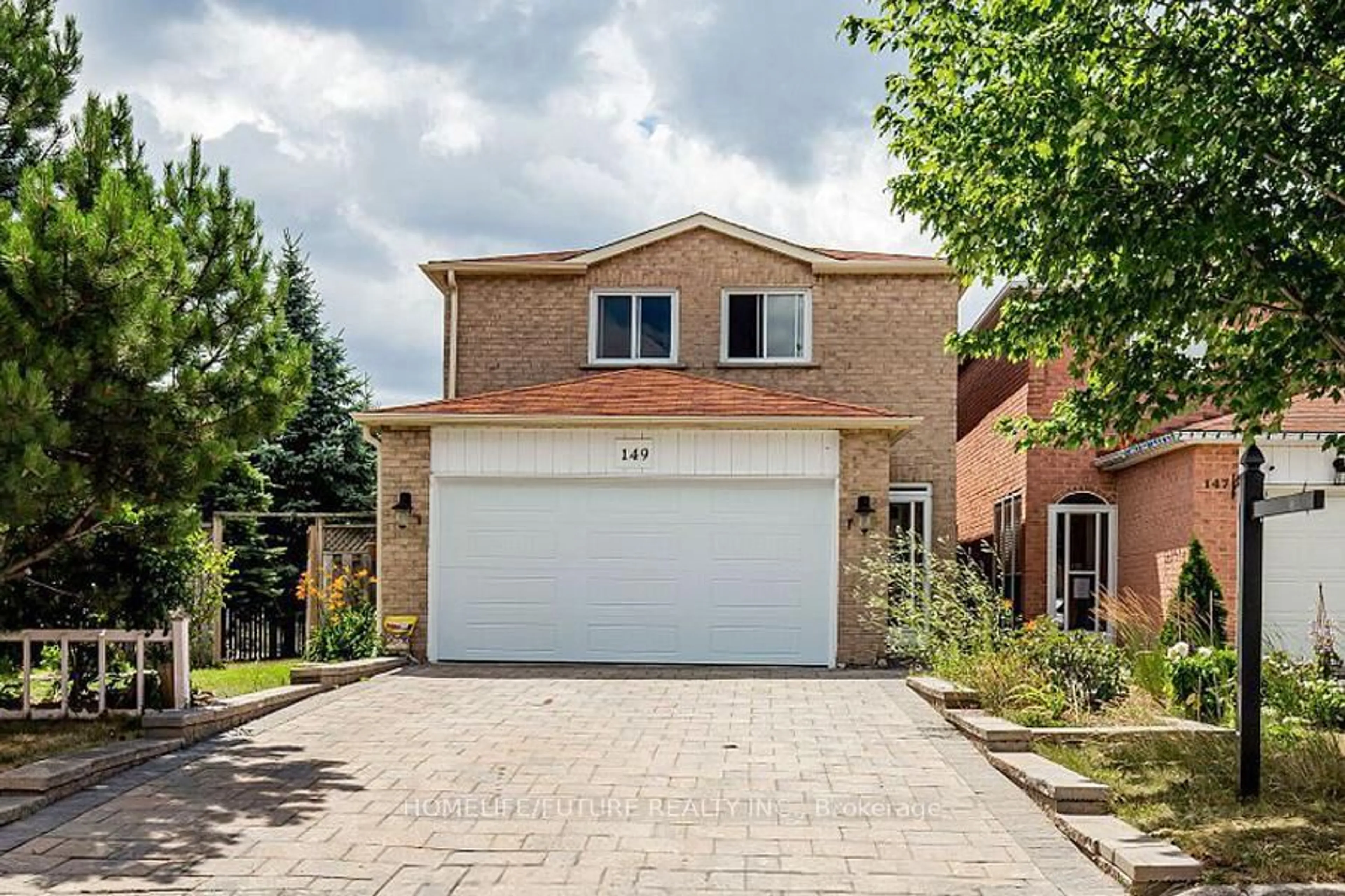 Home with brick exterior material, street for 149 Terrosa Rd, Markham Ontario L3S 2P7