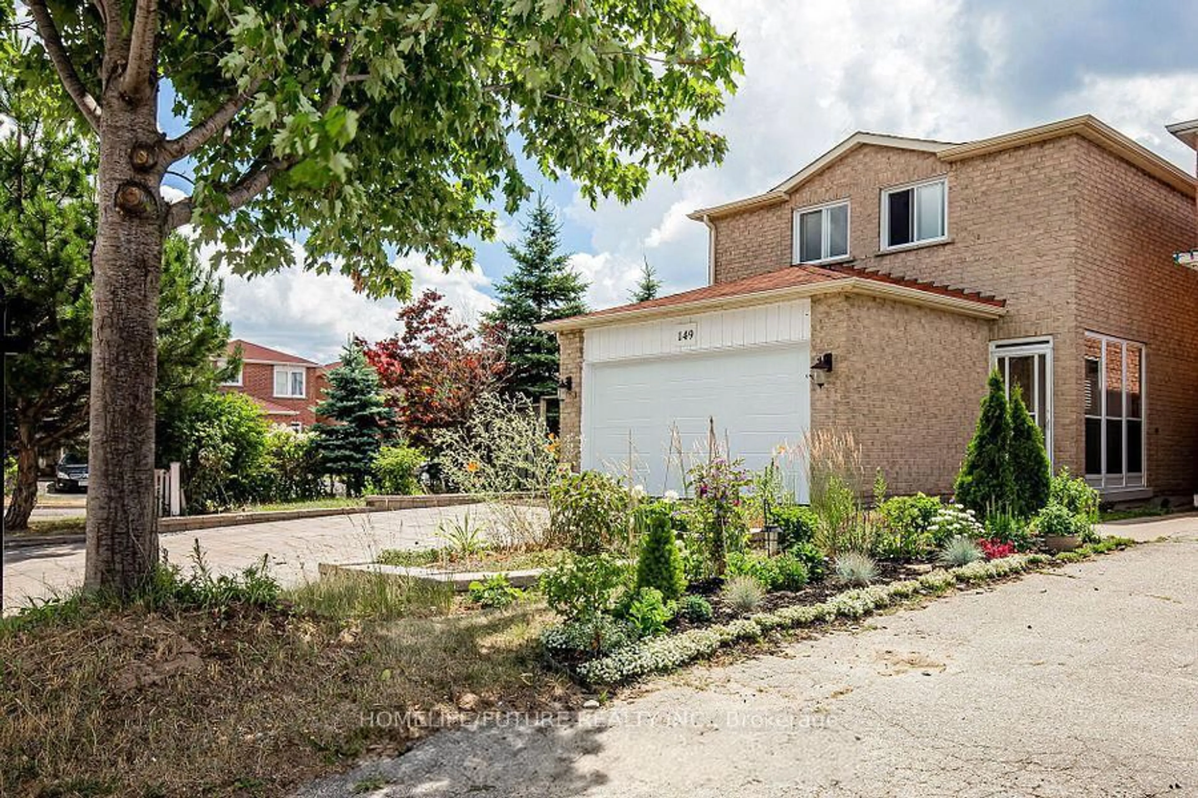 Home with brick exterior material, street for 149 Terrosa Rd, Markham Ontario L3S 2P7