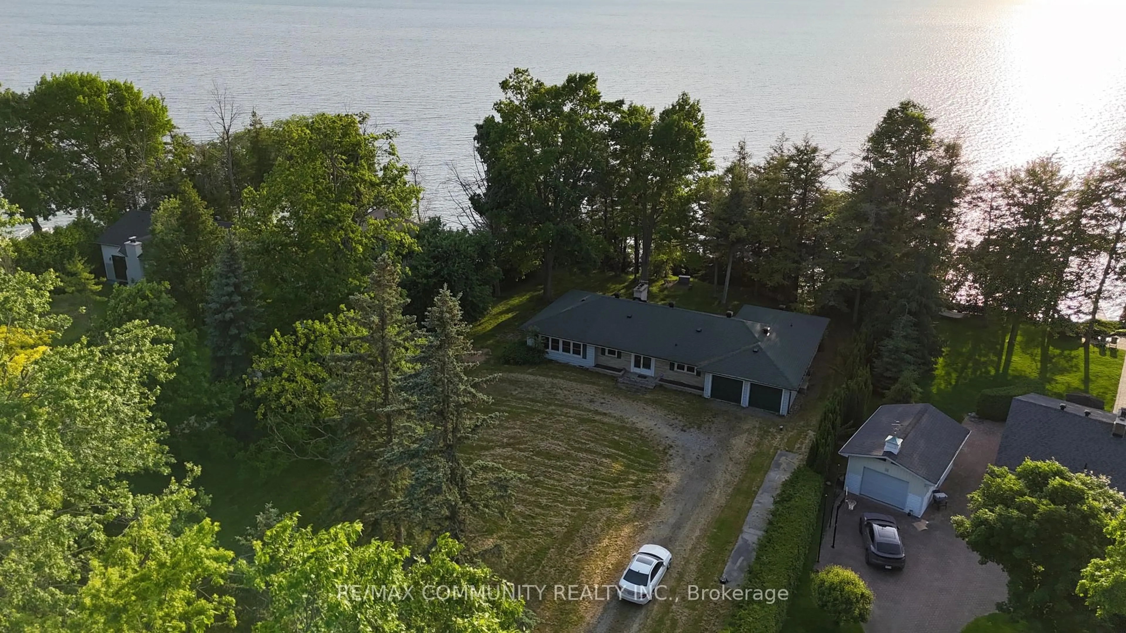 A pic from outside/outdoor area/front of a property/back of a property/a pic from drone, water/lake/river/ocean view for 25100 Maple Beach Rd, Brock Ontario L0K 1A0