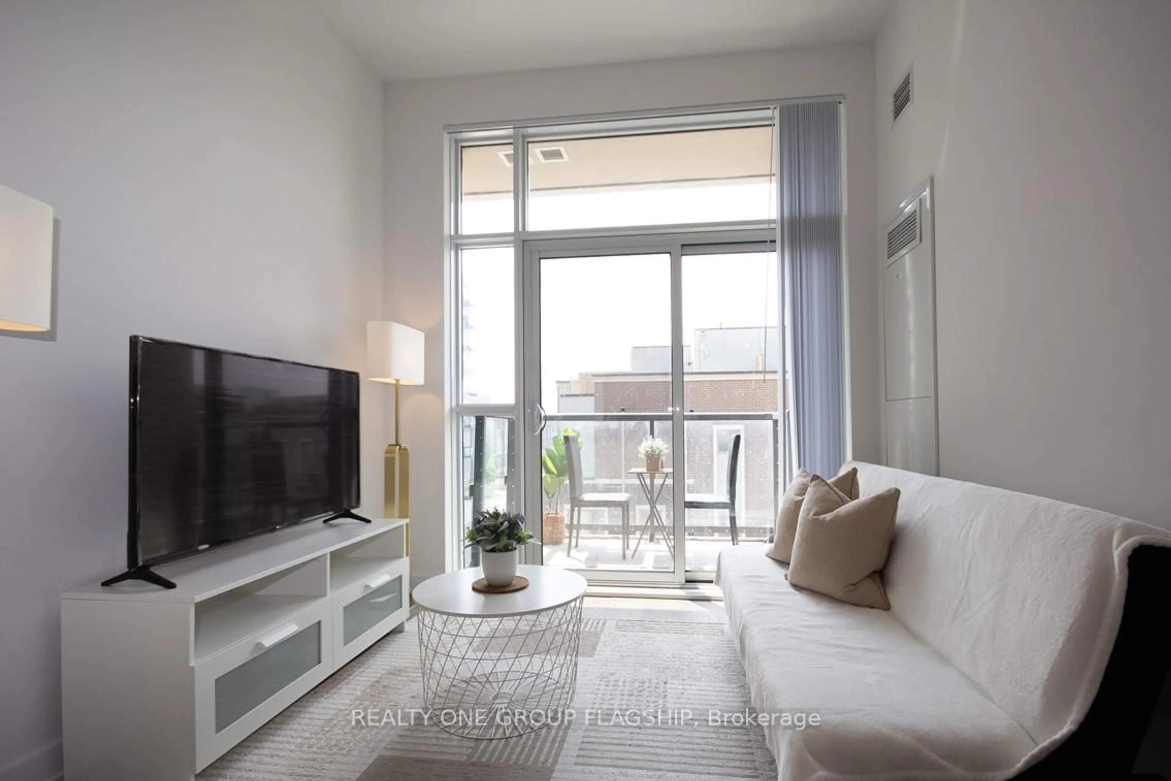 Living room with furniture, unknown for 38 Honeycrisp Cres #308E, Vaughan Ontario L4K 0M8