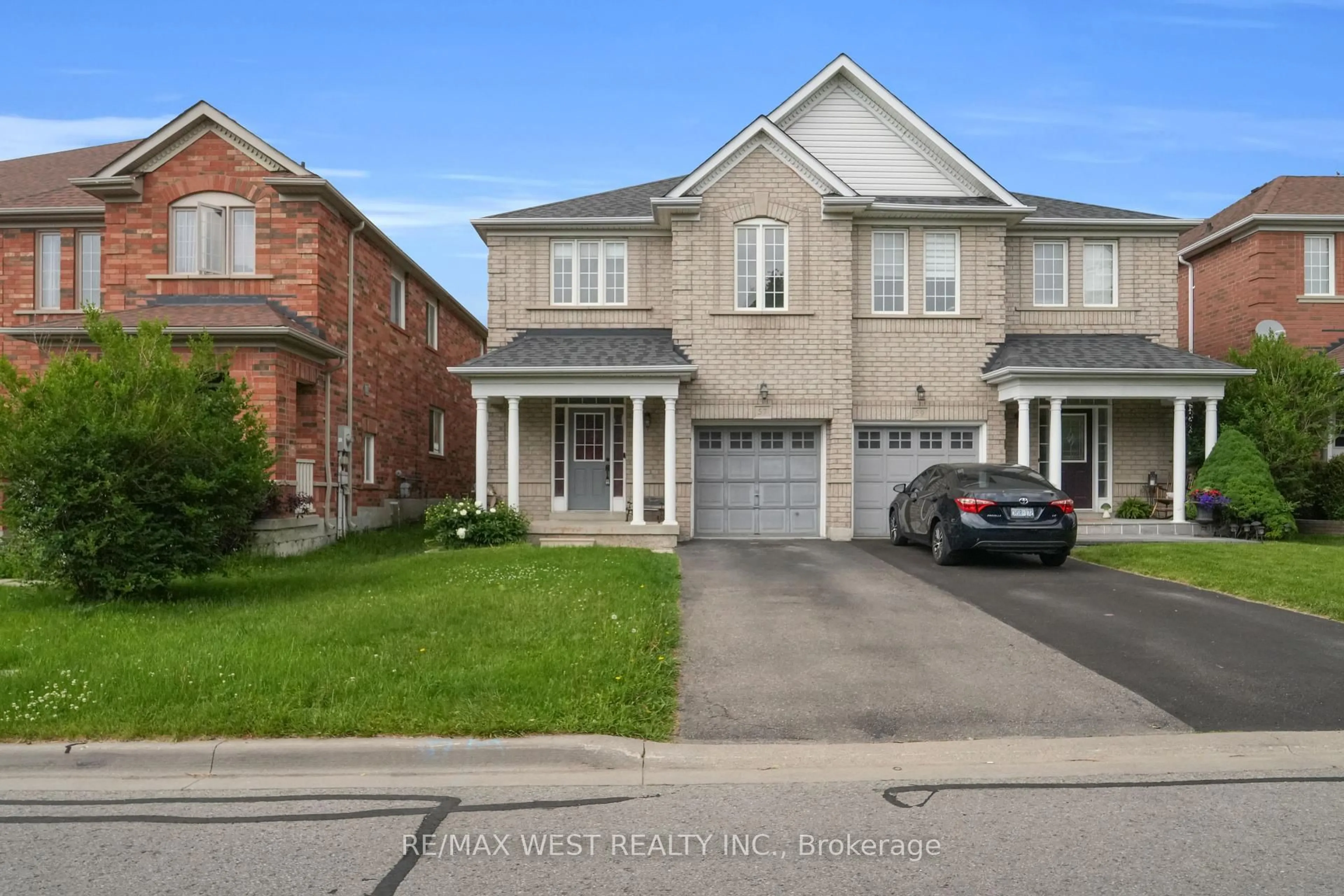 Home with brick exterior material, street for 57 Kalinda Rd, Newmarket Ontario L3X 2Y9
