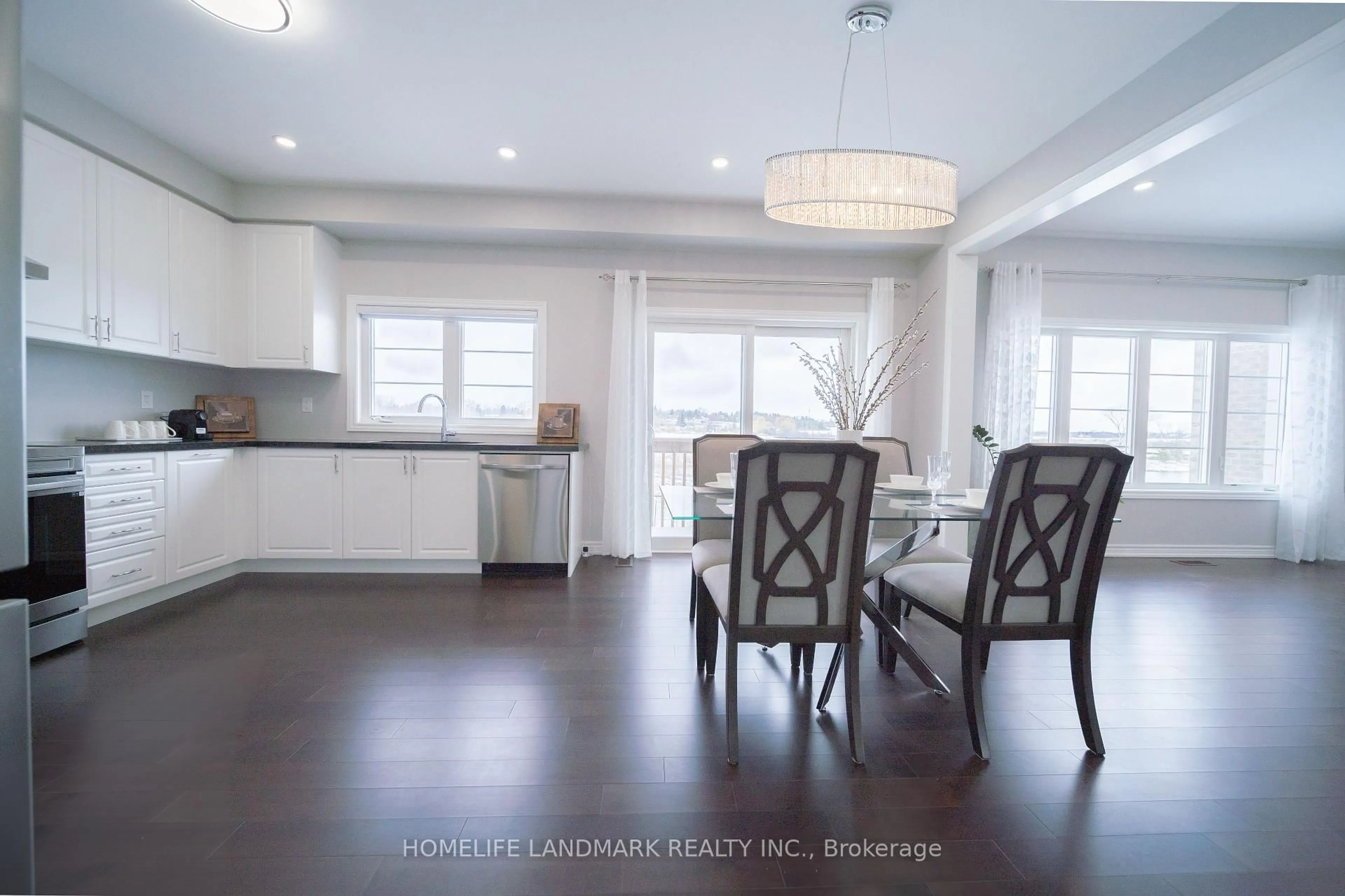 Open concept kitchen, wood/laminate floor for 122 Connell Dr, Georgina Ontario L4P 0K2