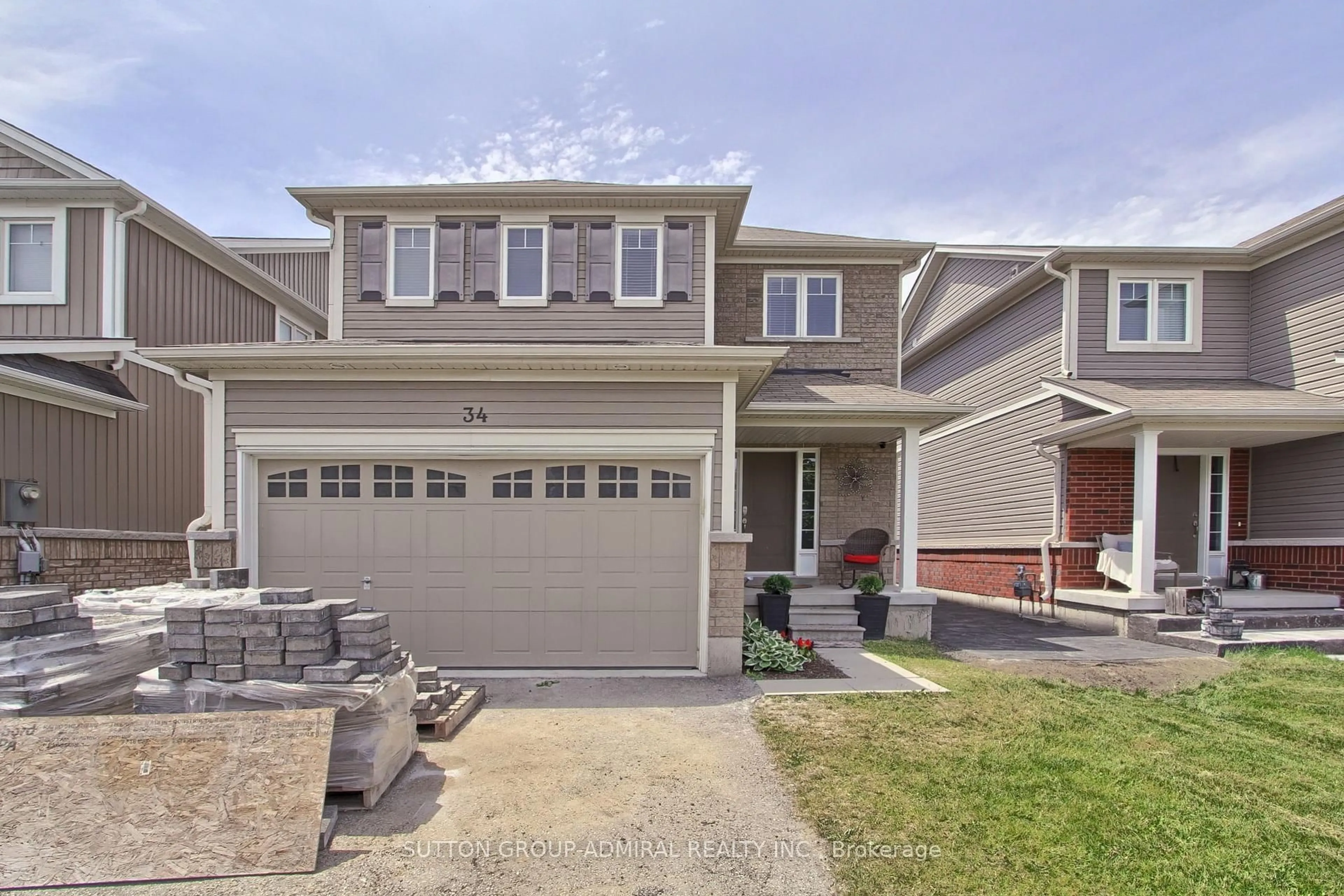 Home with vinyl exterior material, street for 34 Milne St, New Tecumseth Ontario L9R 0A6