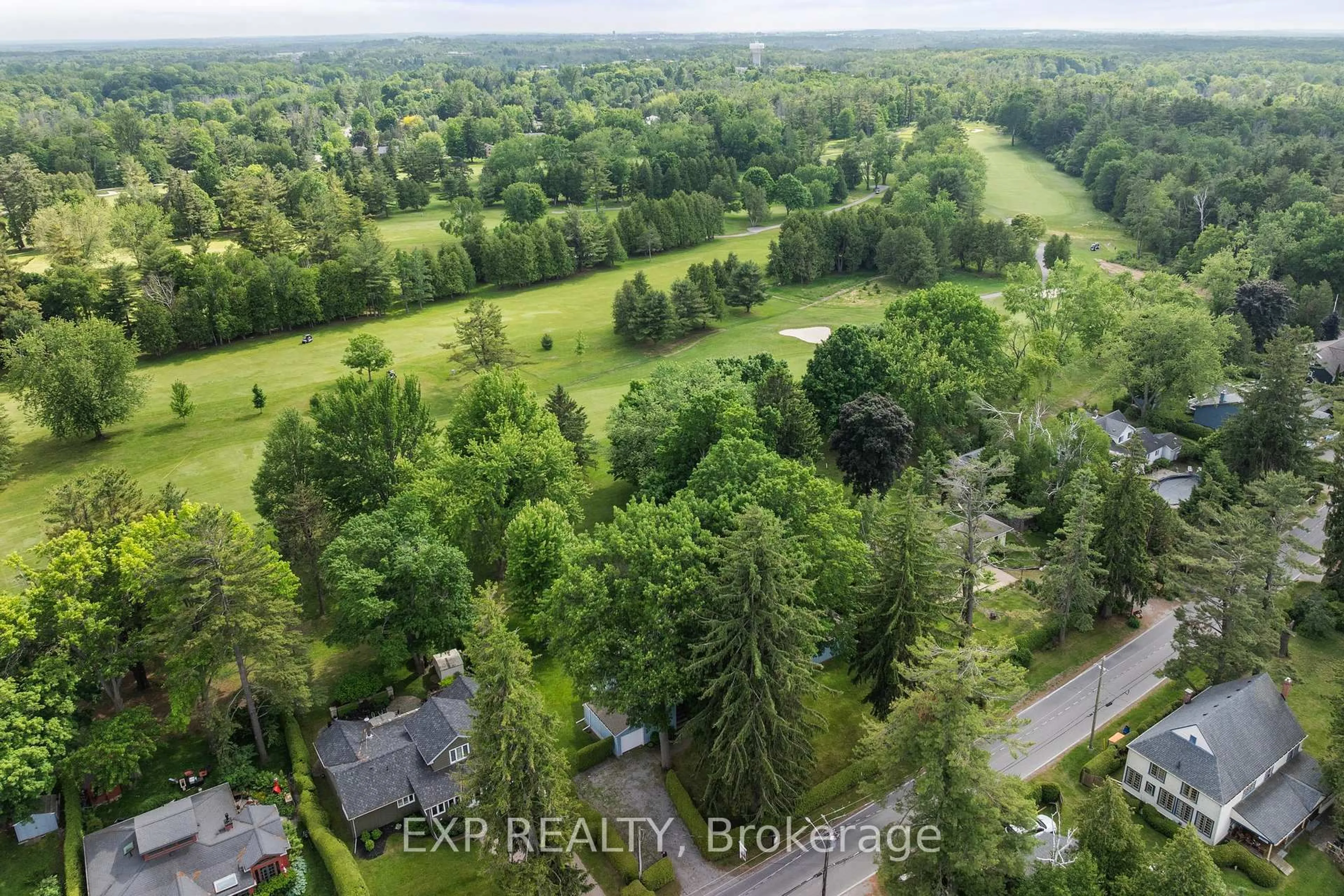 A pic from outside/outdoor area/front of a property/back of a property/a pic from drone, forest/trees view for 101 Hedge Rd, Georgina Ontario L0E 1L0