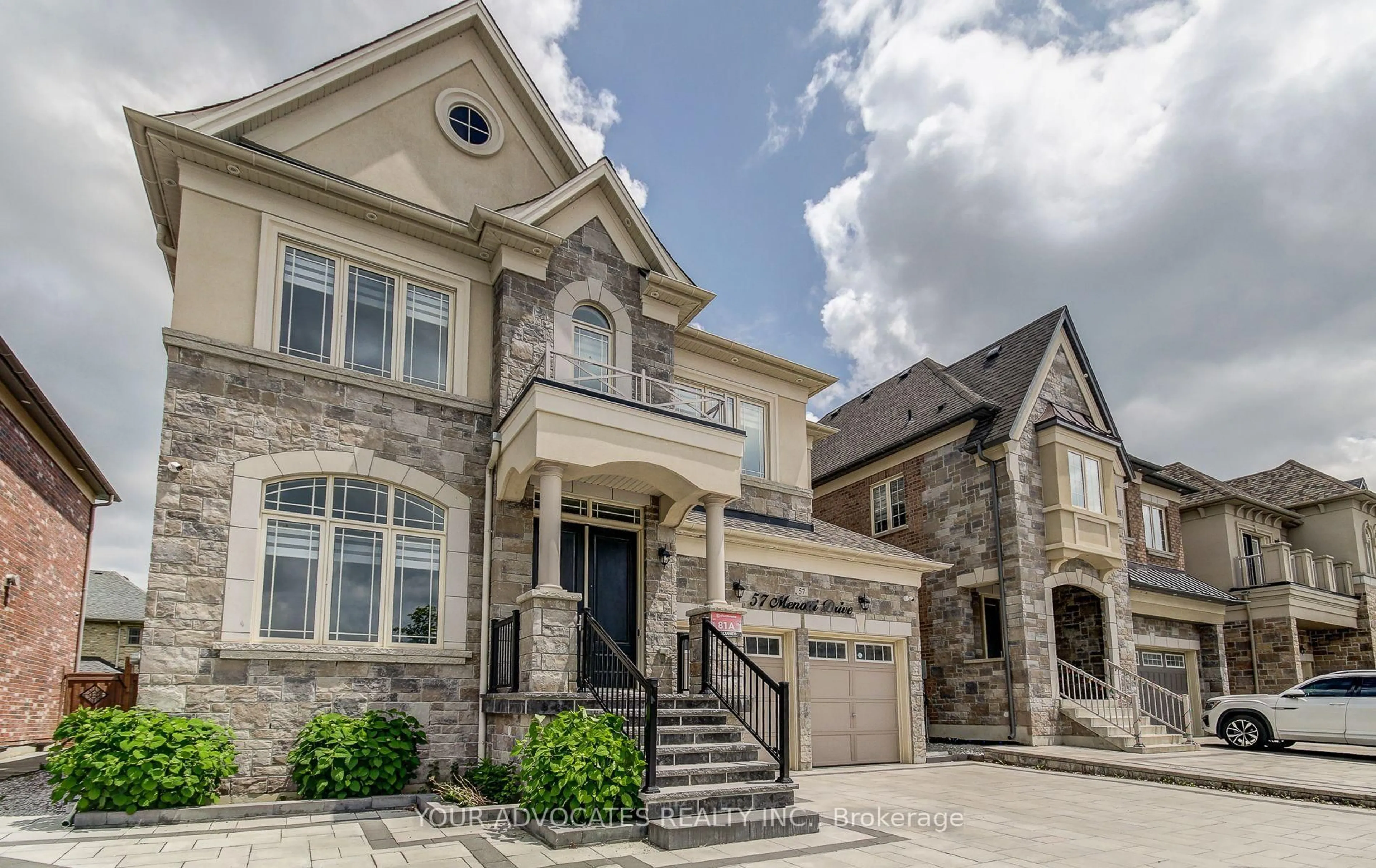 Home with brick exterior material, street for 57 Menotti Dr, Richmond Hill Ontario L4E 0G9