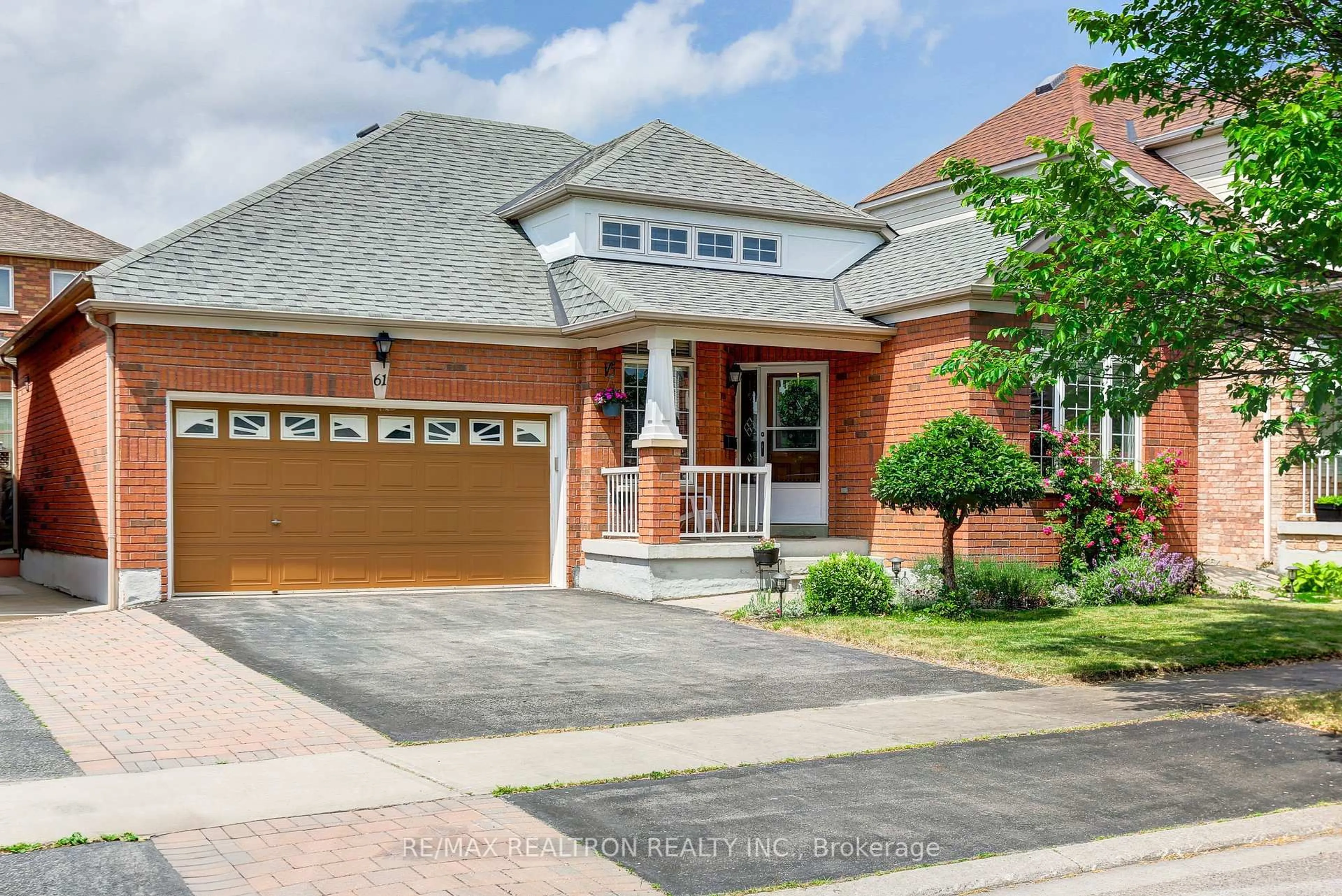 Home with brick exterior material, street for 61 Manorwood Dr, Markham Ontario L6C 2S2