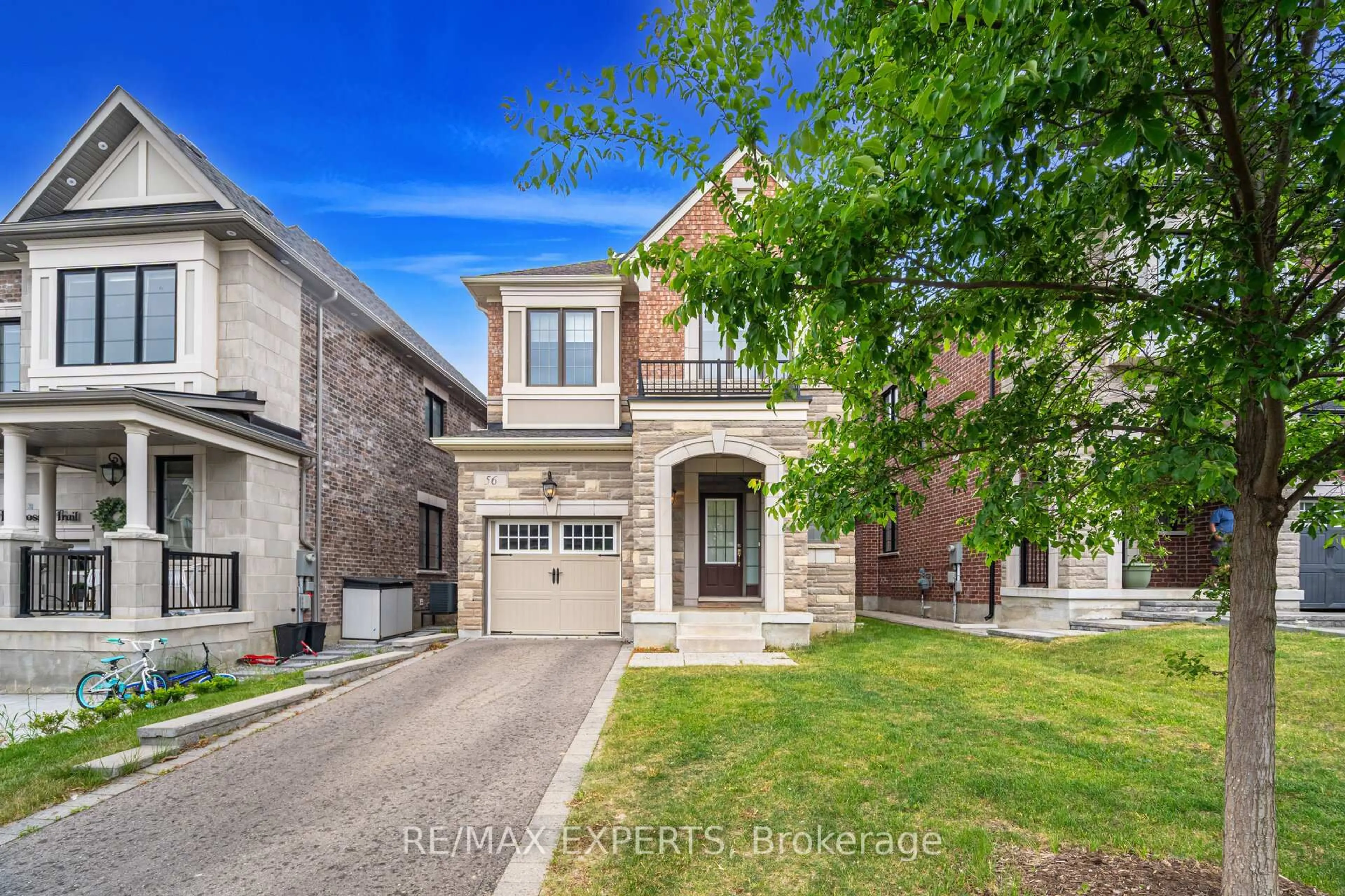 Home with brick exterior material, street for 56 Lacrosse Tr, Vaughan Ontario L4H 4S8