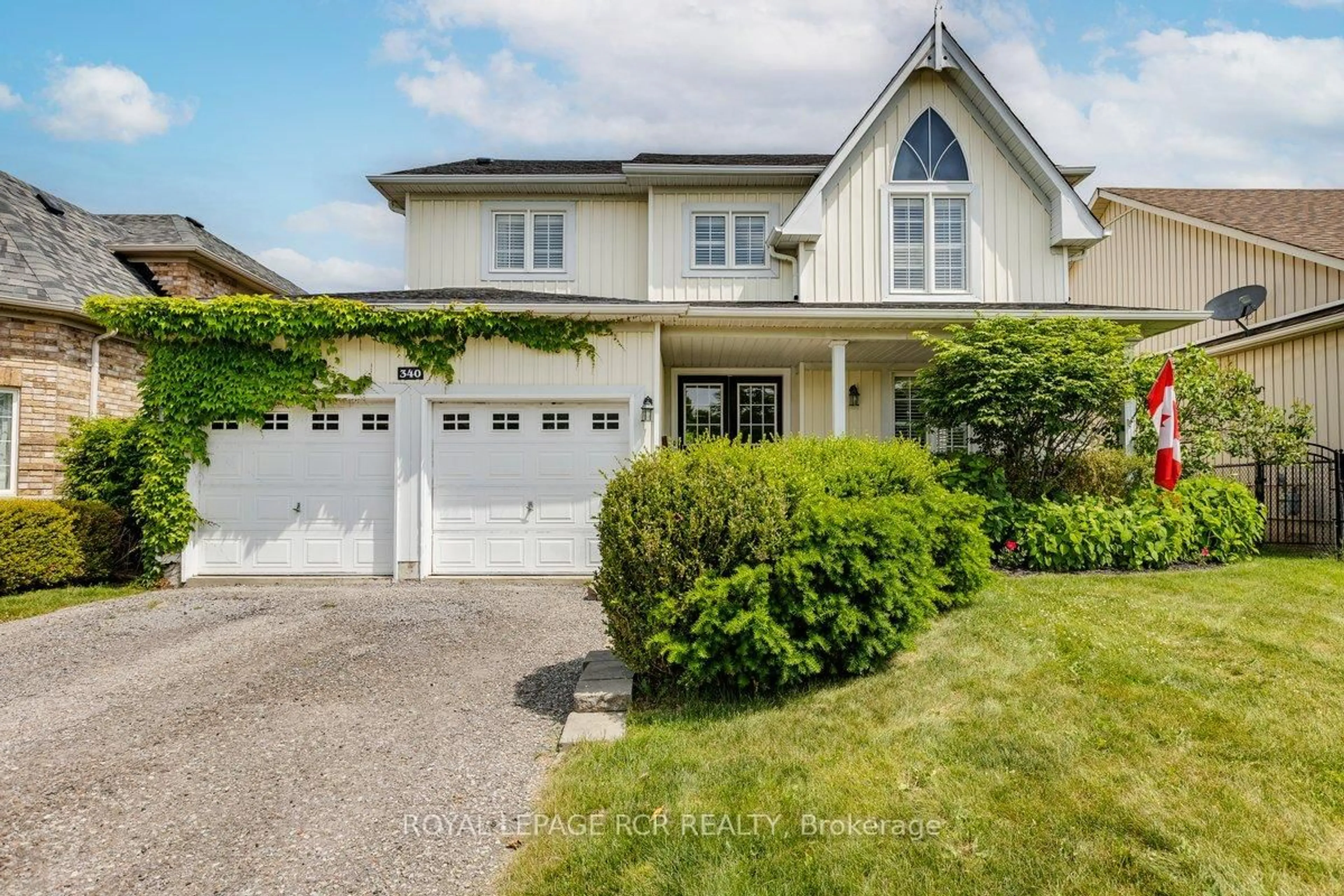 Home with vinyl exterior material, street for 340 King St, East Gwillimbury Ontario L0G 1M0