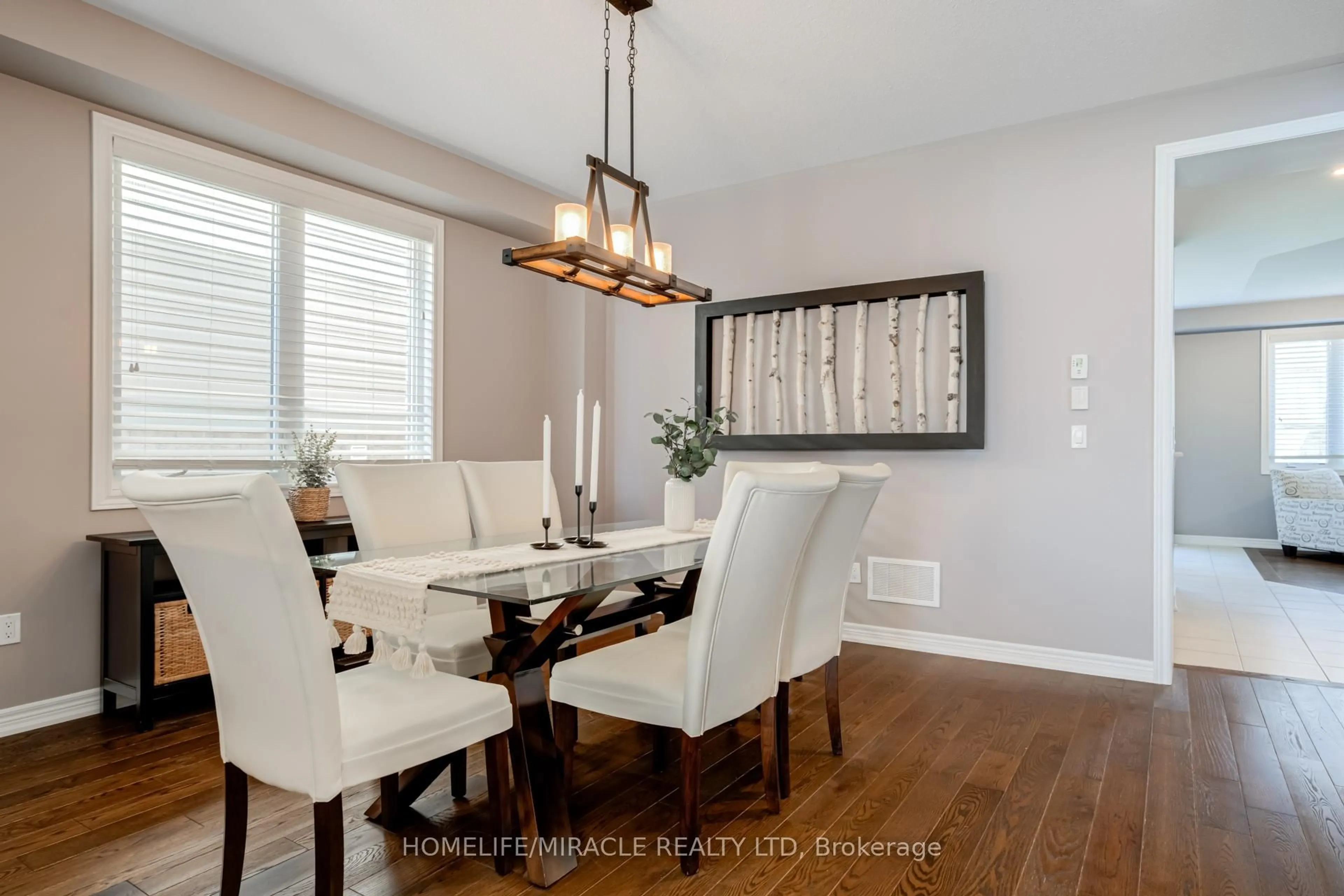 Dining room, wood/laminate floor for 5 Kennedy Blvd, New Tecumseth Ontario L9R 0L4