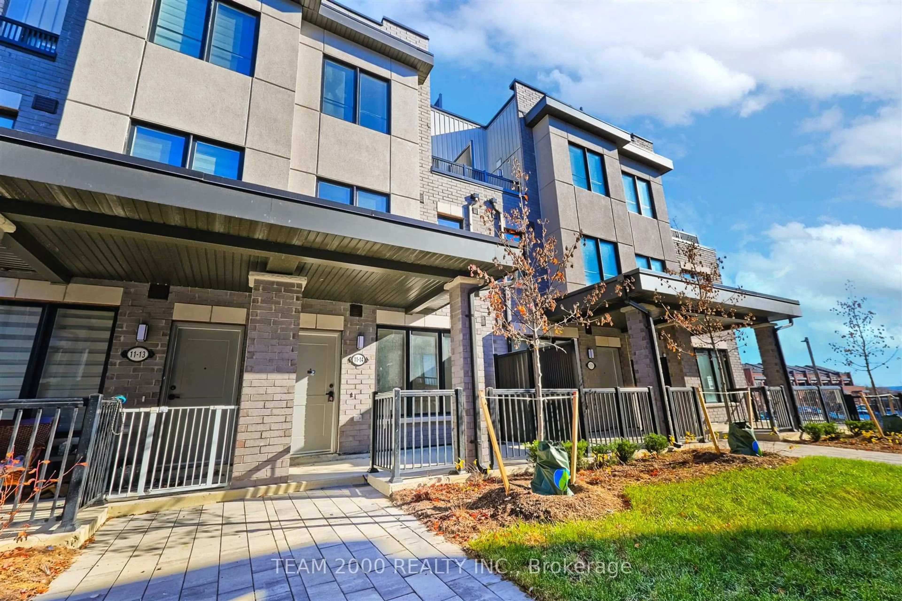 Home with brick exterior material, street for 11 Baynes Way #14, Bradford West Gwillimbury Ontario L3Z 4M5