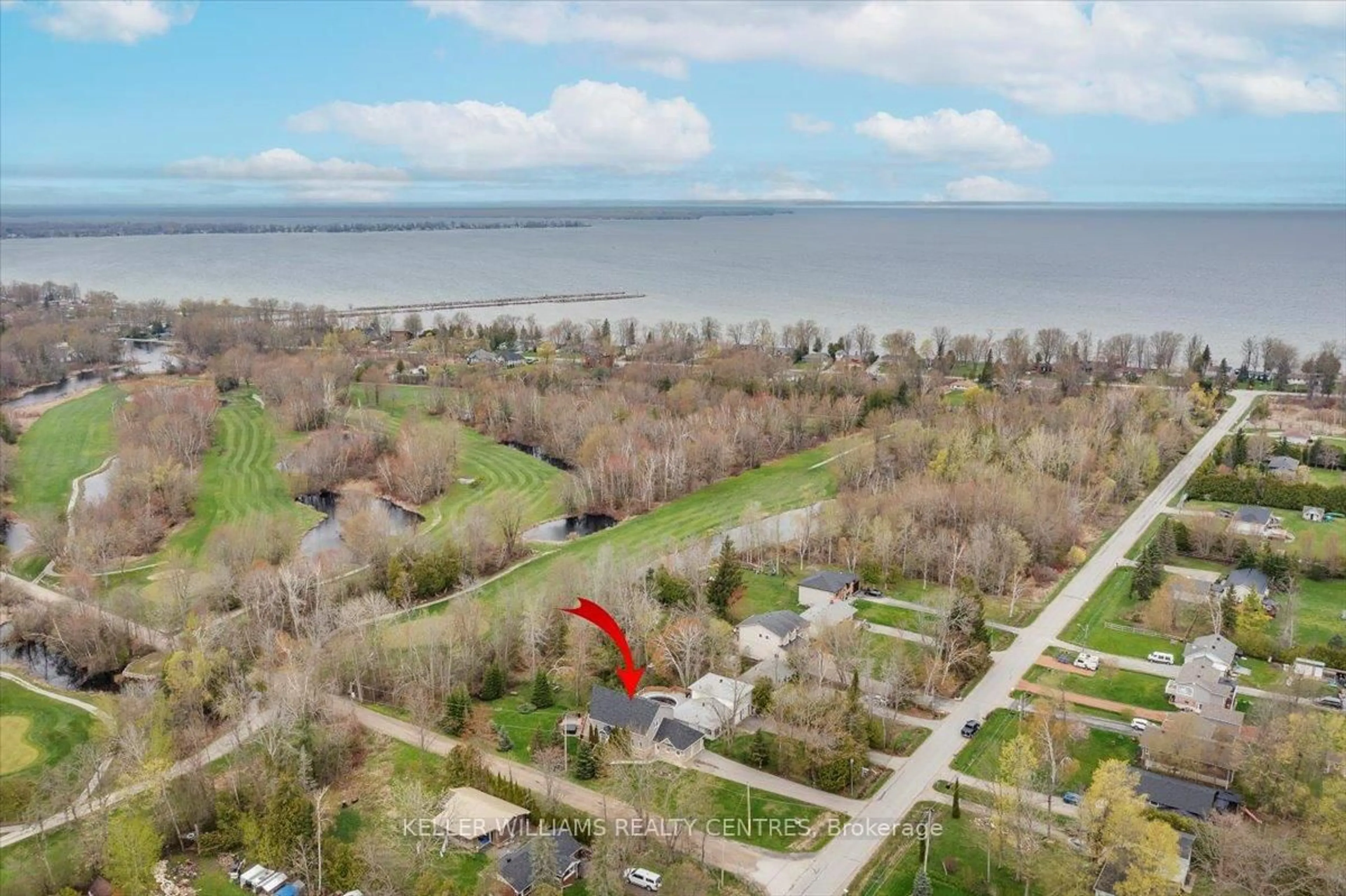 A pic from outside/outdoor area/front of a property/back of a property/a pic from drone, water/lake/river/ocean view for 94 Riverview Beach Rd, Georgina Ontario L0E 1N0