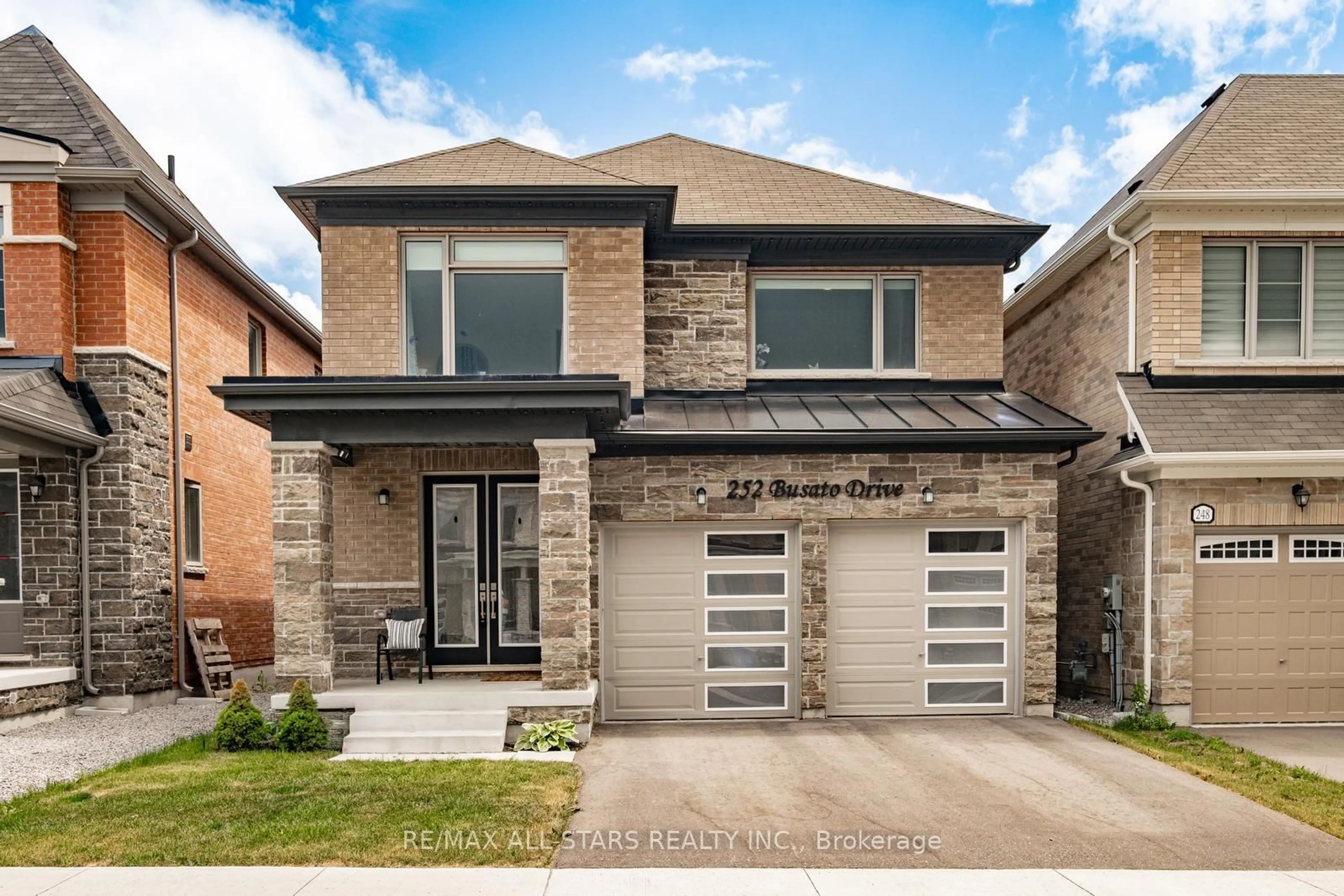 Home with brick exterior material, street for 252 Busato Dr, Whitchurch-Stouffville Ontario L4A 4X3