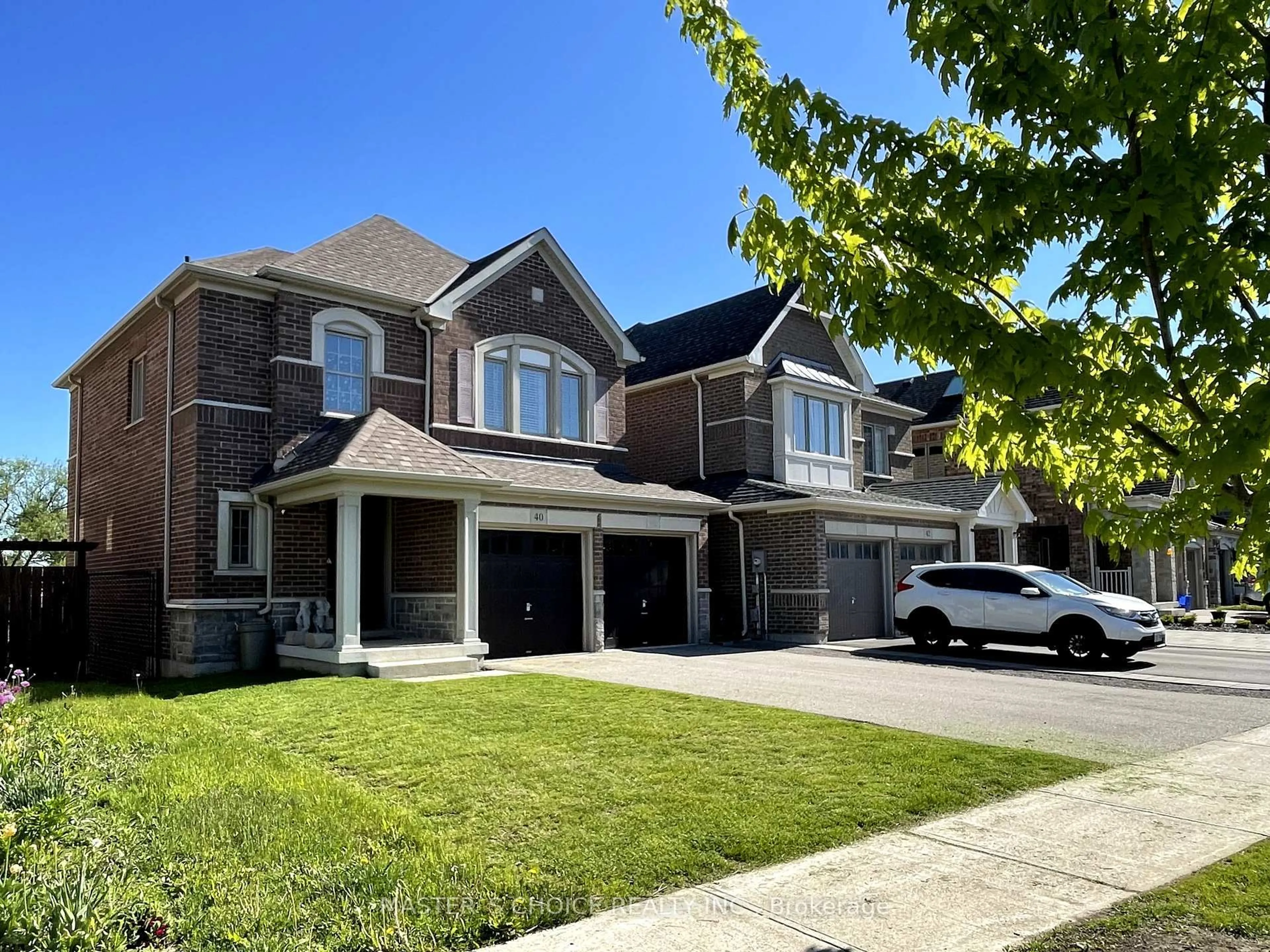 Home with brick exterior material, street for 40 Briarfield Ave, East Gwillimbury Ontario L9N 0P5