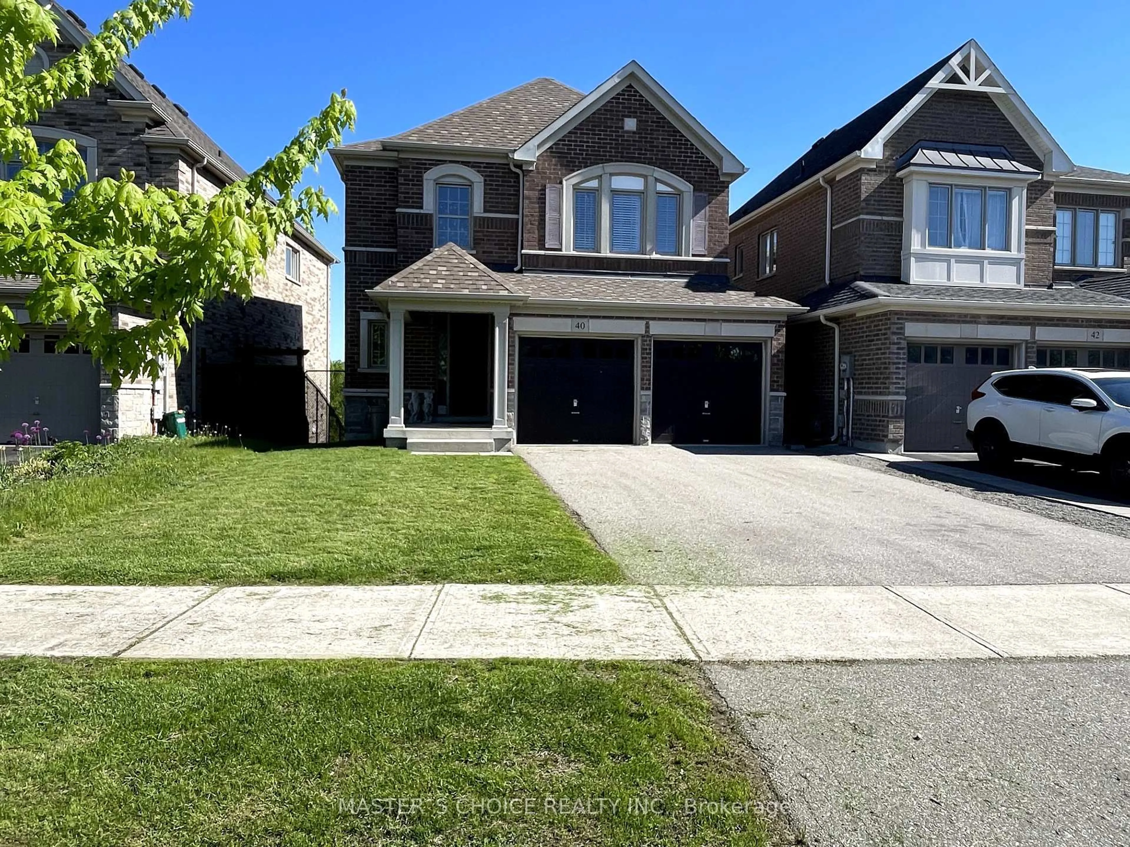 Home with brick exterior material, street for 40 Briarfield Ave, East Gwillimbury Ontario L9N 0P5