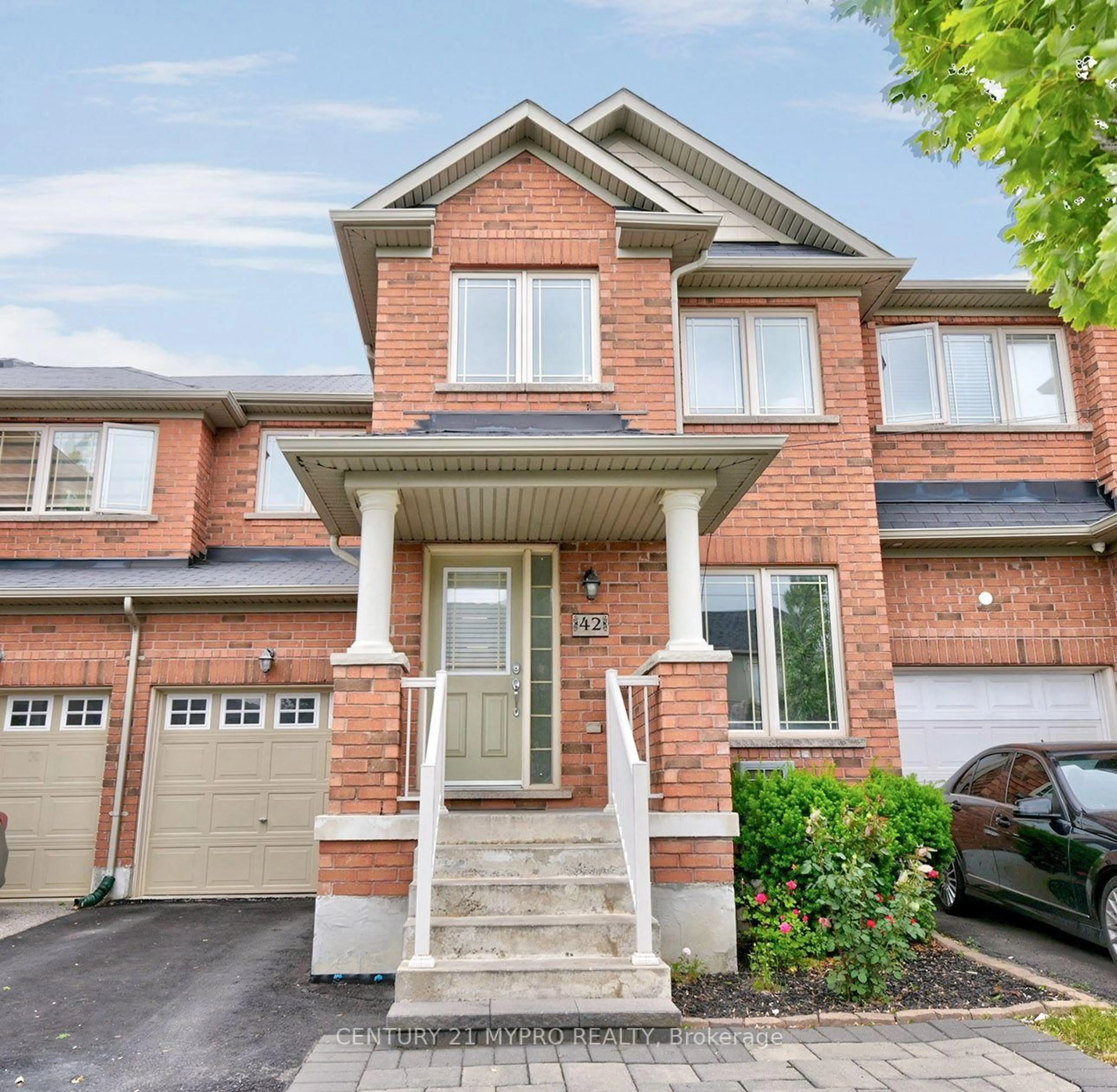 Home with brick exterior material, street for 42 Sequin Dr, Richmond Hill Ontario L4E 0J2