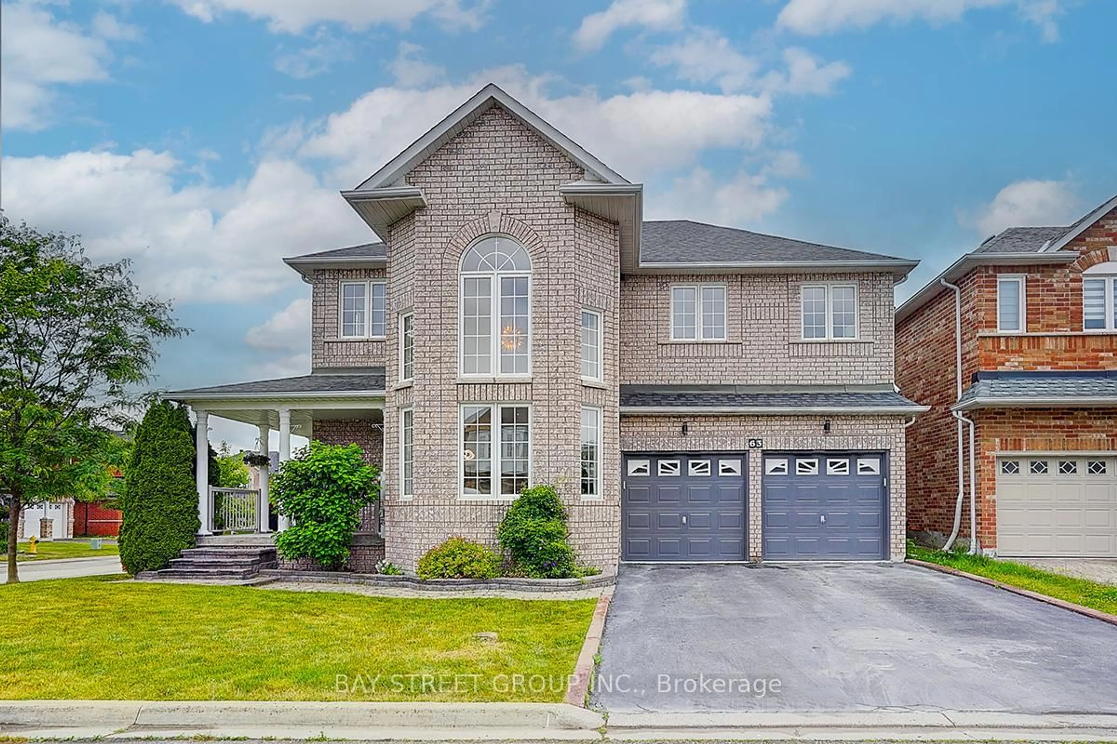 Home with brick exterior material, street for 63 Brookhaven Cres, Markham Ontario L6C 2X8